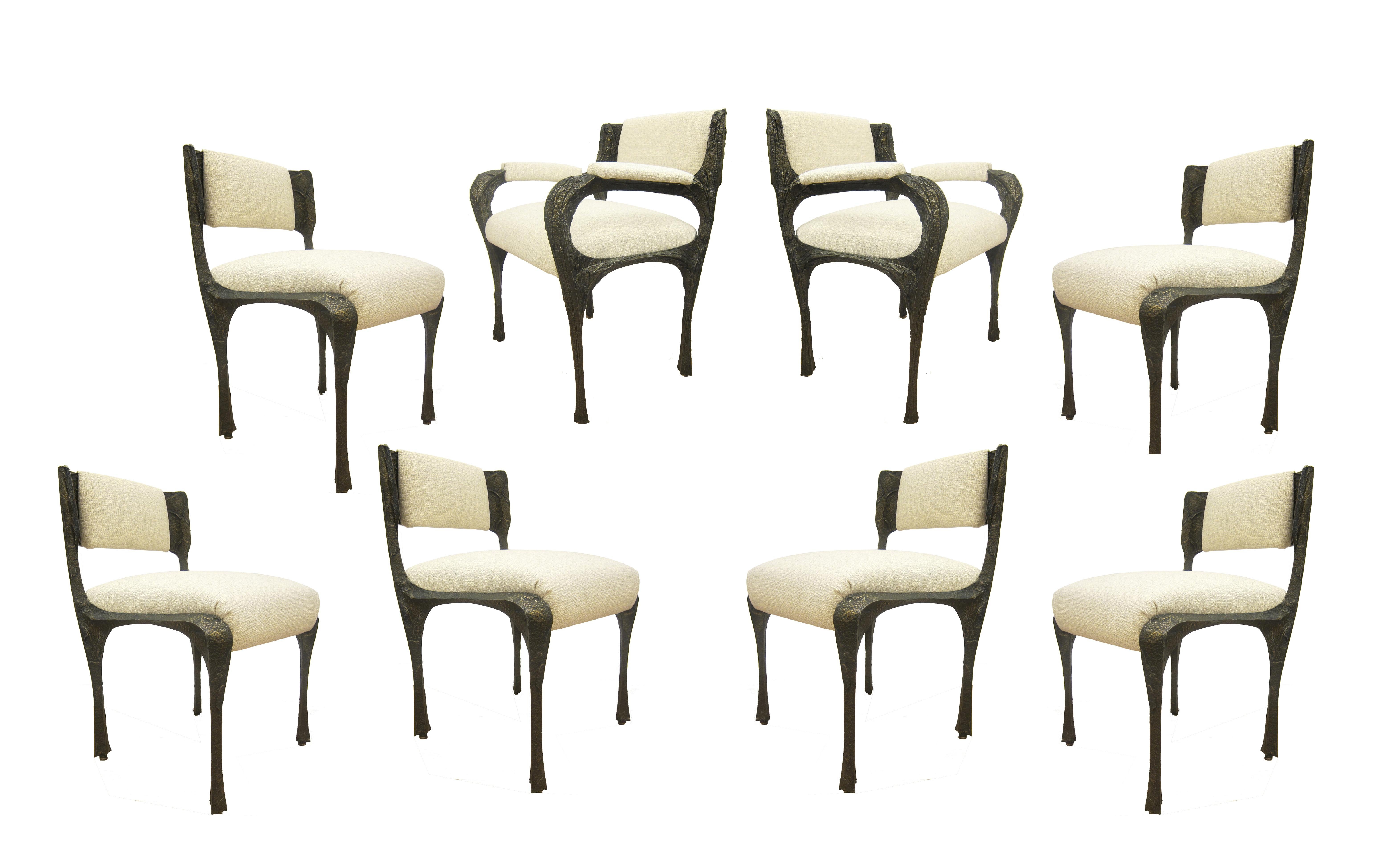 Complete sculpted bronze series dining room set by Paul Evans
This extremely rare set consists of:
One iconic stalagmite shape dining table with glass plate top, model PE 102. Signed and dated PE73
One set of eight dining room chairs, two armchairs