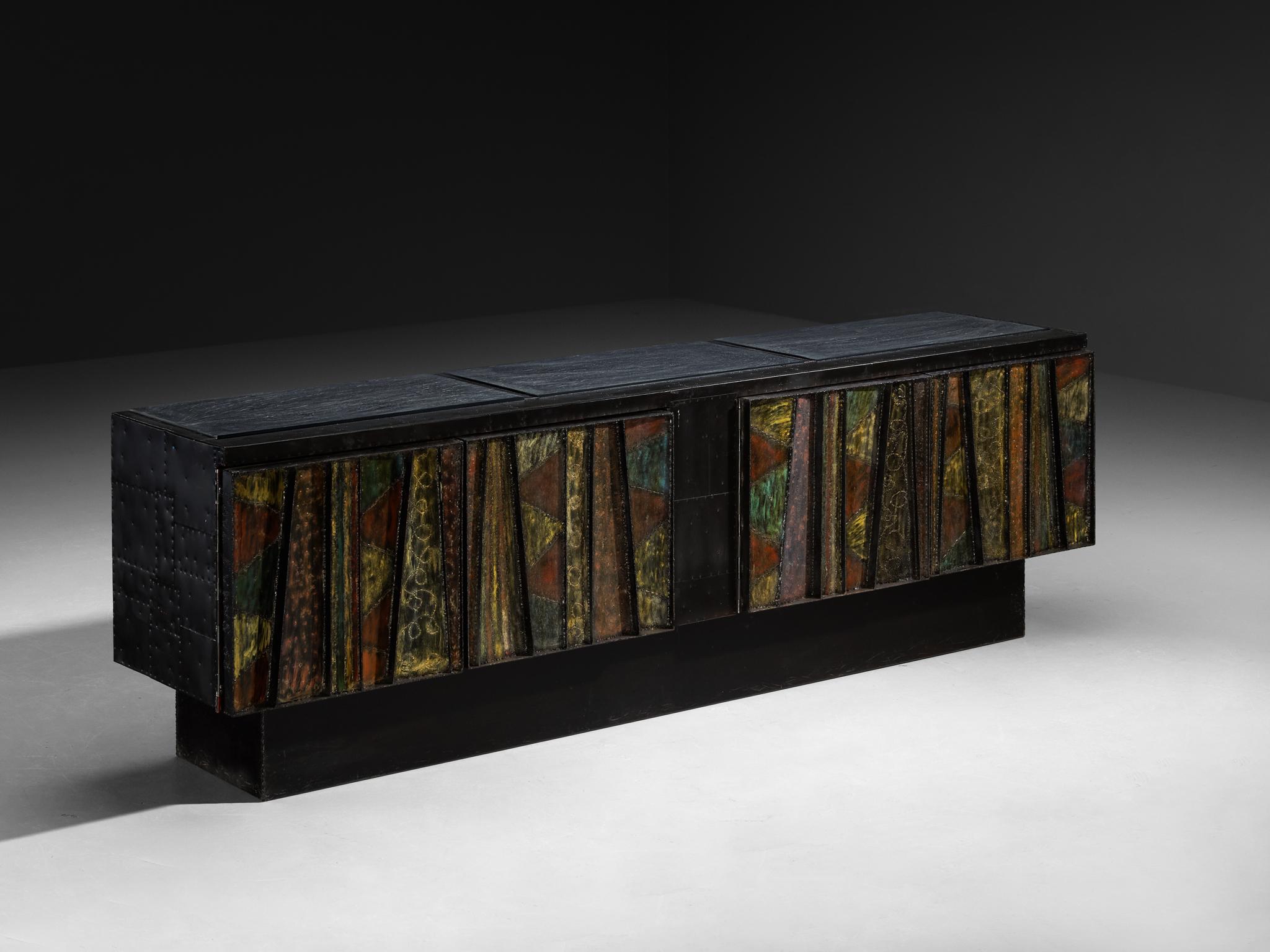Paul Evans, Paul Evans Studio for Directional, 'Deep Relief' sideboard, model 'PE-42', welded steel, painted oak, cleft slate, United States, 1968

An exceptional design by Paul Evans undeniably breathes artistic excellence combined with impeccable