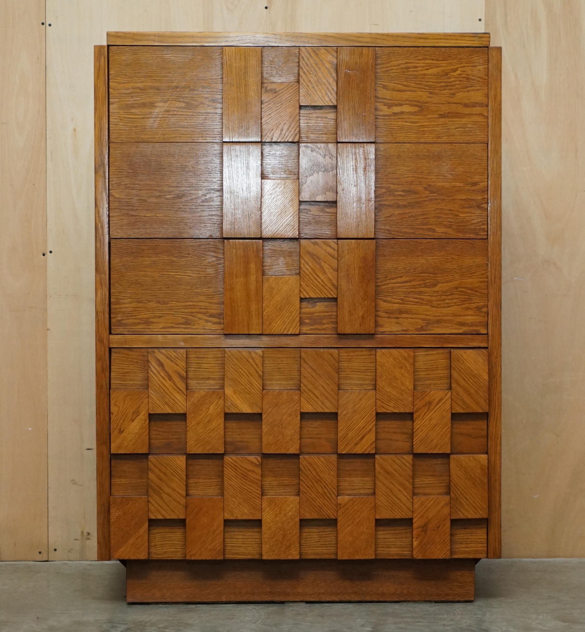 We are delighted to offer for sale this stunning original Paul Evans designed for Lane Furniture, Brutalist tallboy chest of drawers which is part of a suite.

Paul Evans was an American furniture designer and sculptor known for his unique tables