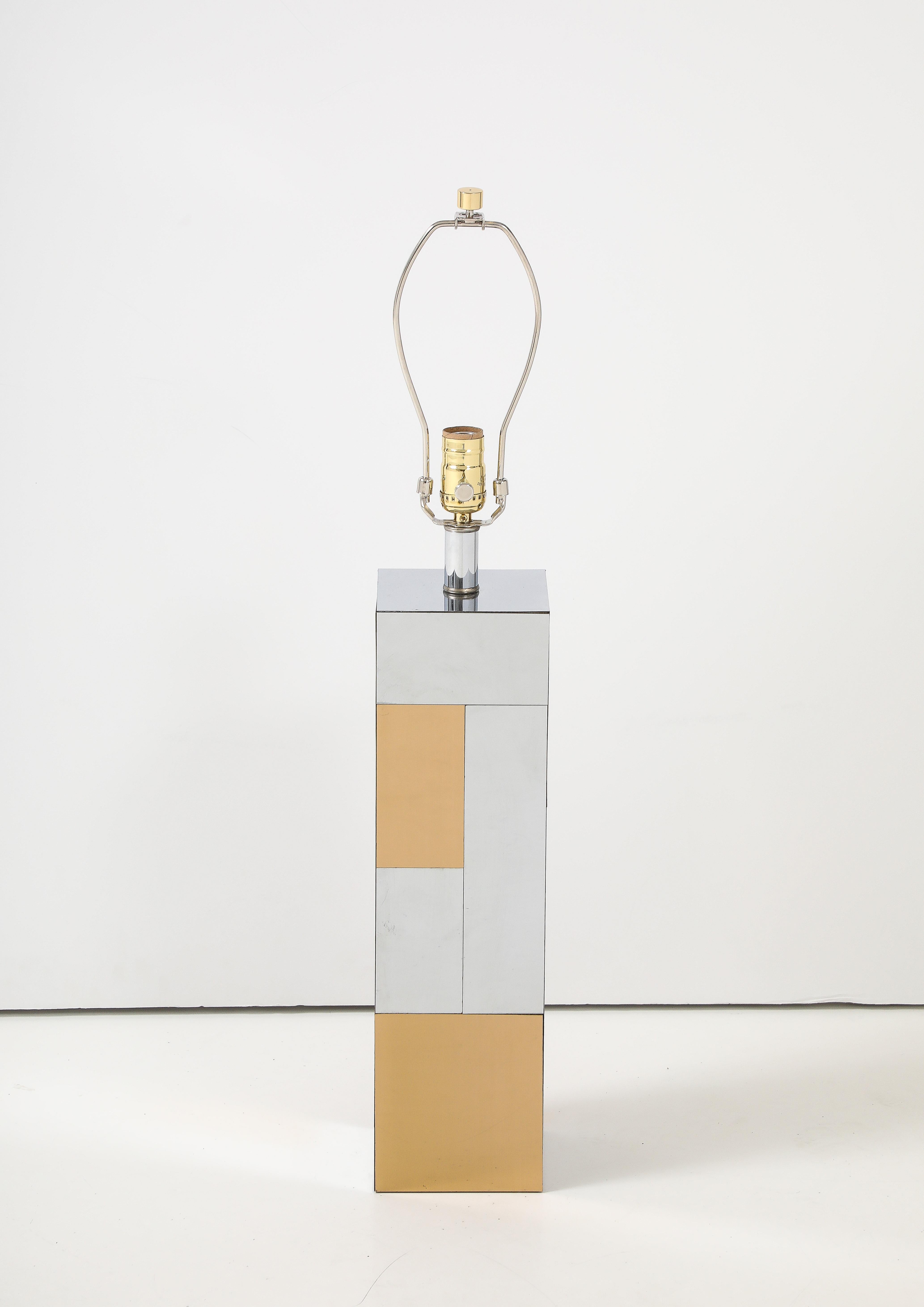 Paul Evans for Directional Table Lamp, Cityscape Series. Graphic patchwork of chrome and brass.

The Cityscape series by Paul Evans for Directional is a result of the company seeking to produce a more craftsman like product. It was a huge success