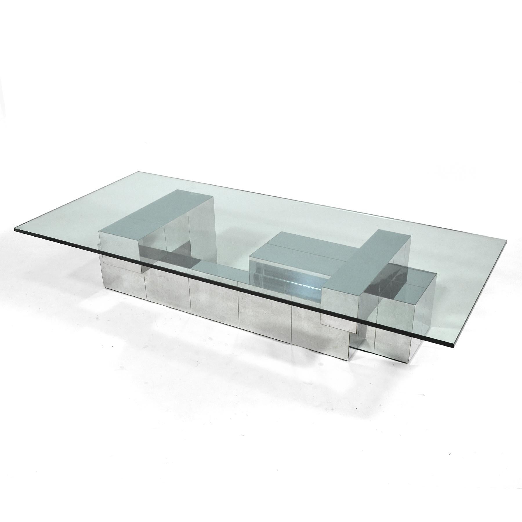 This impressive, oversize Paul Evans coffee table by Directional has not only a terrific scale, it also features a wonderful architectural composition clad in chrome plated patchwork. It's not only the largest 