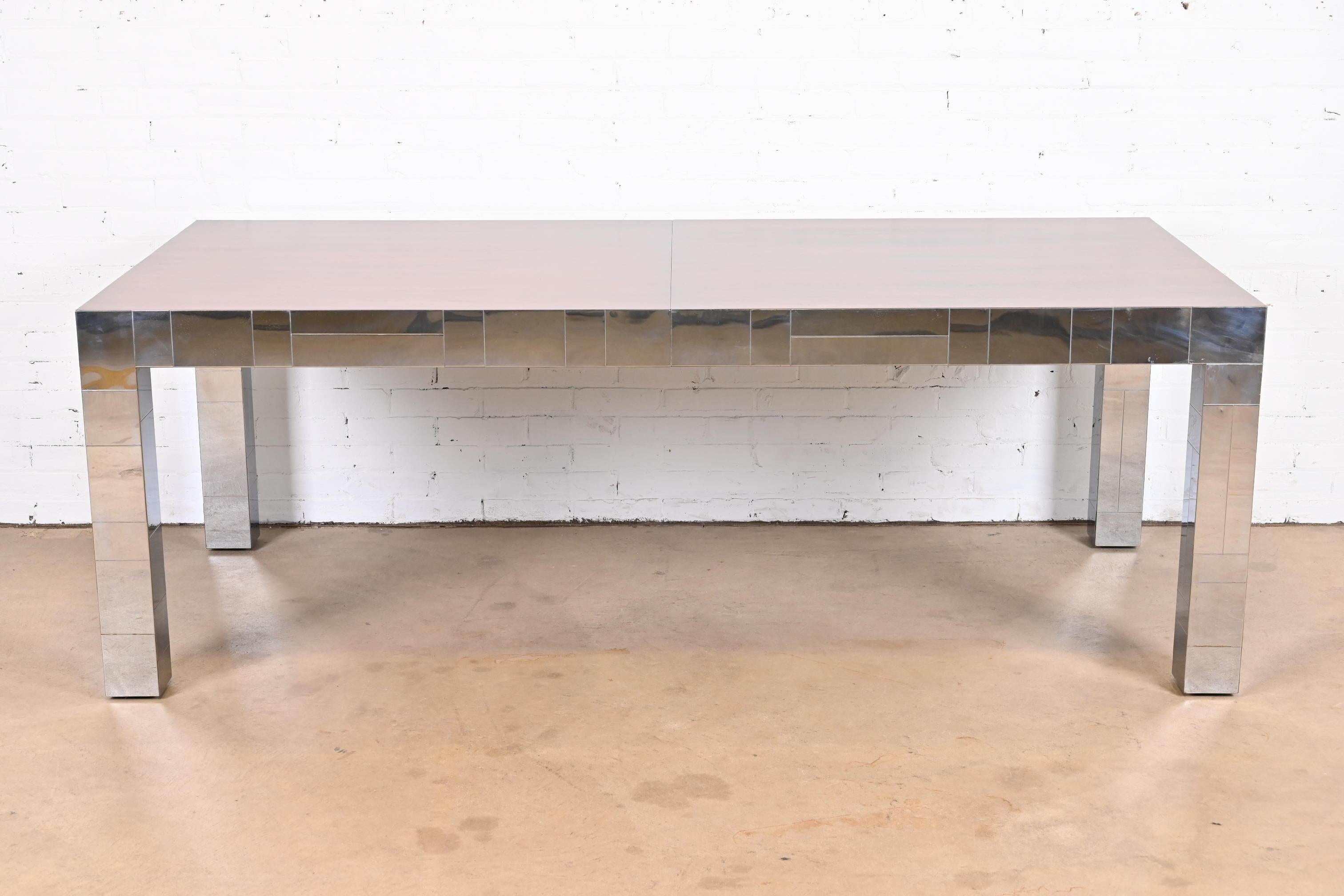 A rare and exceptional Mid-Century Modern Parsons extension dining table

By Paul Evans for Directional, 