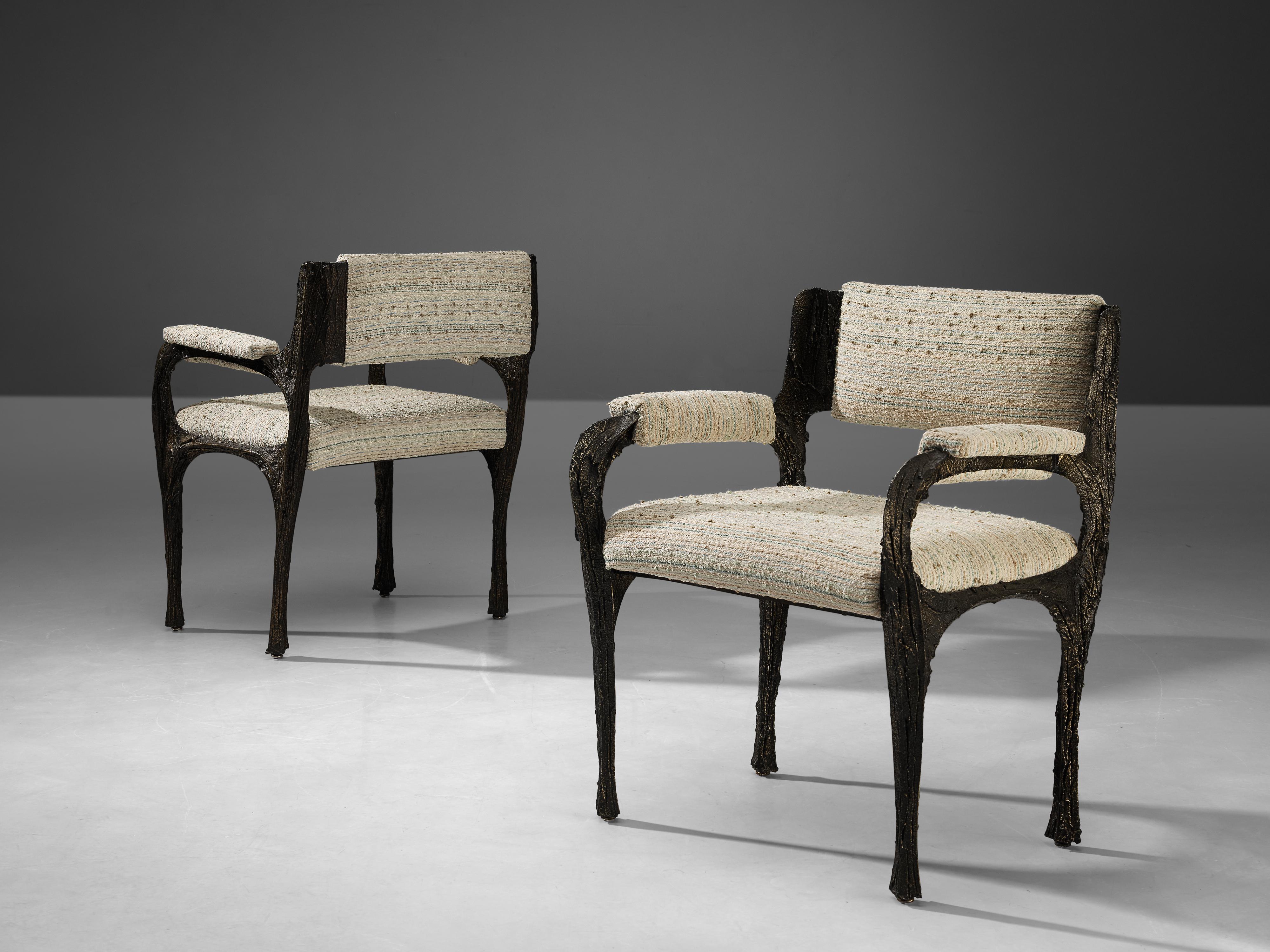 Paul Evans for Directional, pair of armchairs from the series PE-105, sculpted bronze, fabric, United States, circa 1965 

These armchairs are designed by Paul Evans for Directional around 1965. This design excels in craftsmanship, material use,