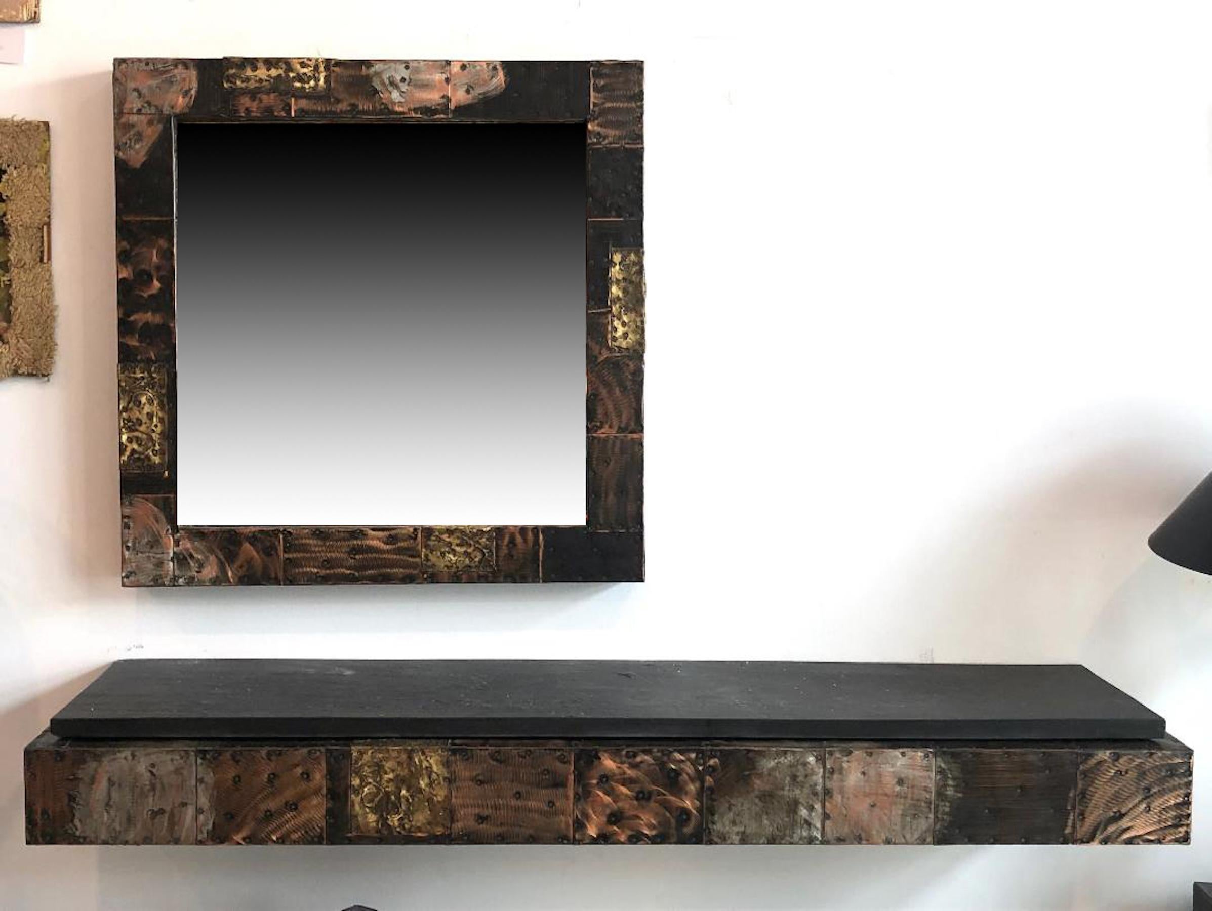 Paul Evans
Wall-mounted console, model PE 17 and mirror, model PE 18
Paul Evans Studio for Directional, USA, circa 1970
Welded and enameled steel, welded and enameled copper, slate, mirror
Console measures: 60 W × 13 D × 7 H inches
Slate: