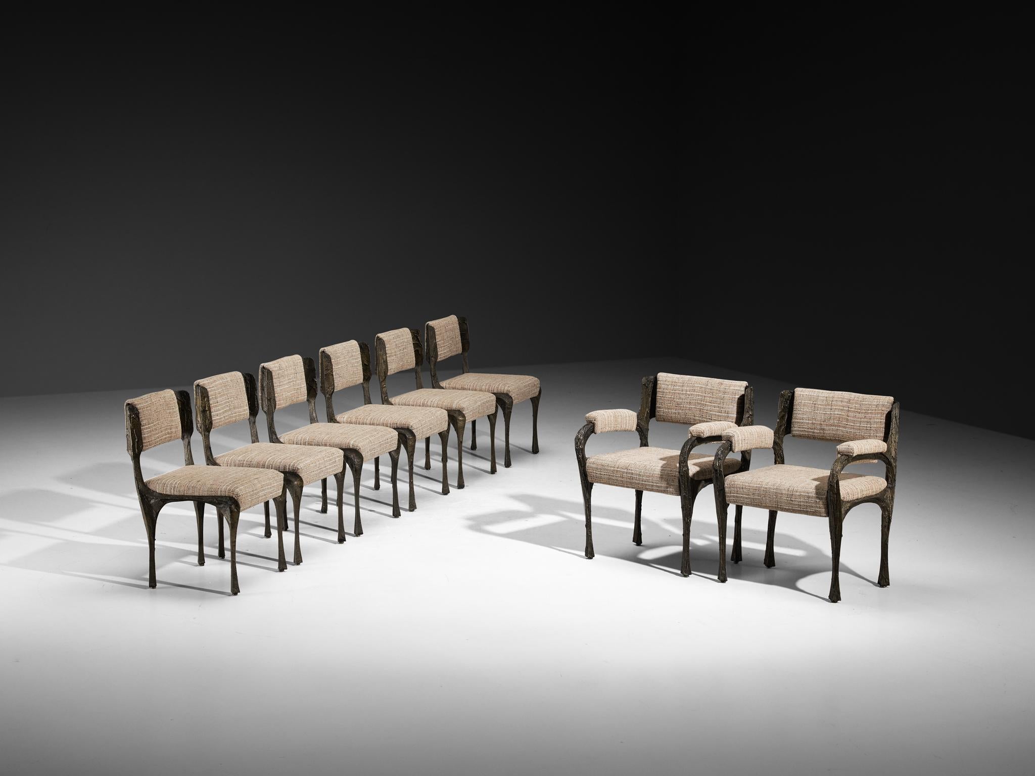 Paul Evans for Directional, dining chairs, model PE-106, epoxy bronzed resin over steel, fabric, United States, circa 1970

These dining chairs are designed by Paul Evans for Directional. This design excels in craftsmanship, material use,