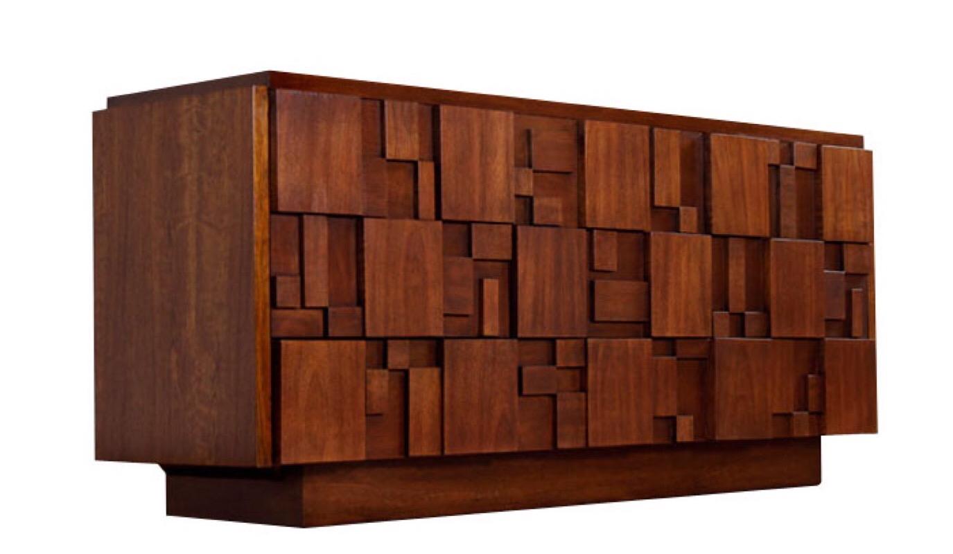 Mid-Century Modern Brutalist nine drawer dresser by Lane Furniture Co. for the Staccato collection. This dresser features Gorgeous walnut wood grain. The Drawer facade has mosaic chunk block details and Highly sought after design. It sits on a
