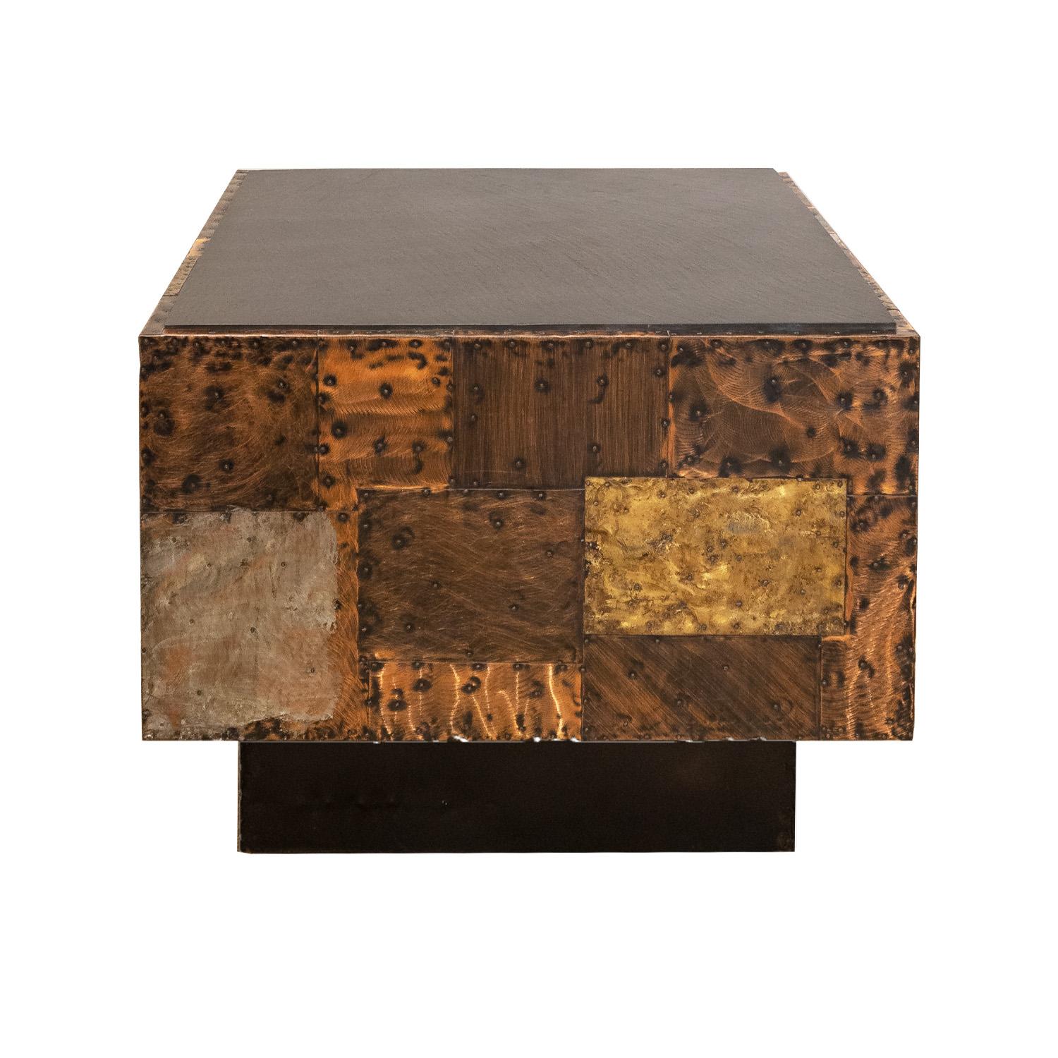 Patchwork Side Table, model PE-31, in enameled and patinated copper, brass and steel over plywood with an inset cleft slate top by Paul Evans for Directional Furniture, American 1970s.  This table is on recessed castors so it can be moved around