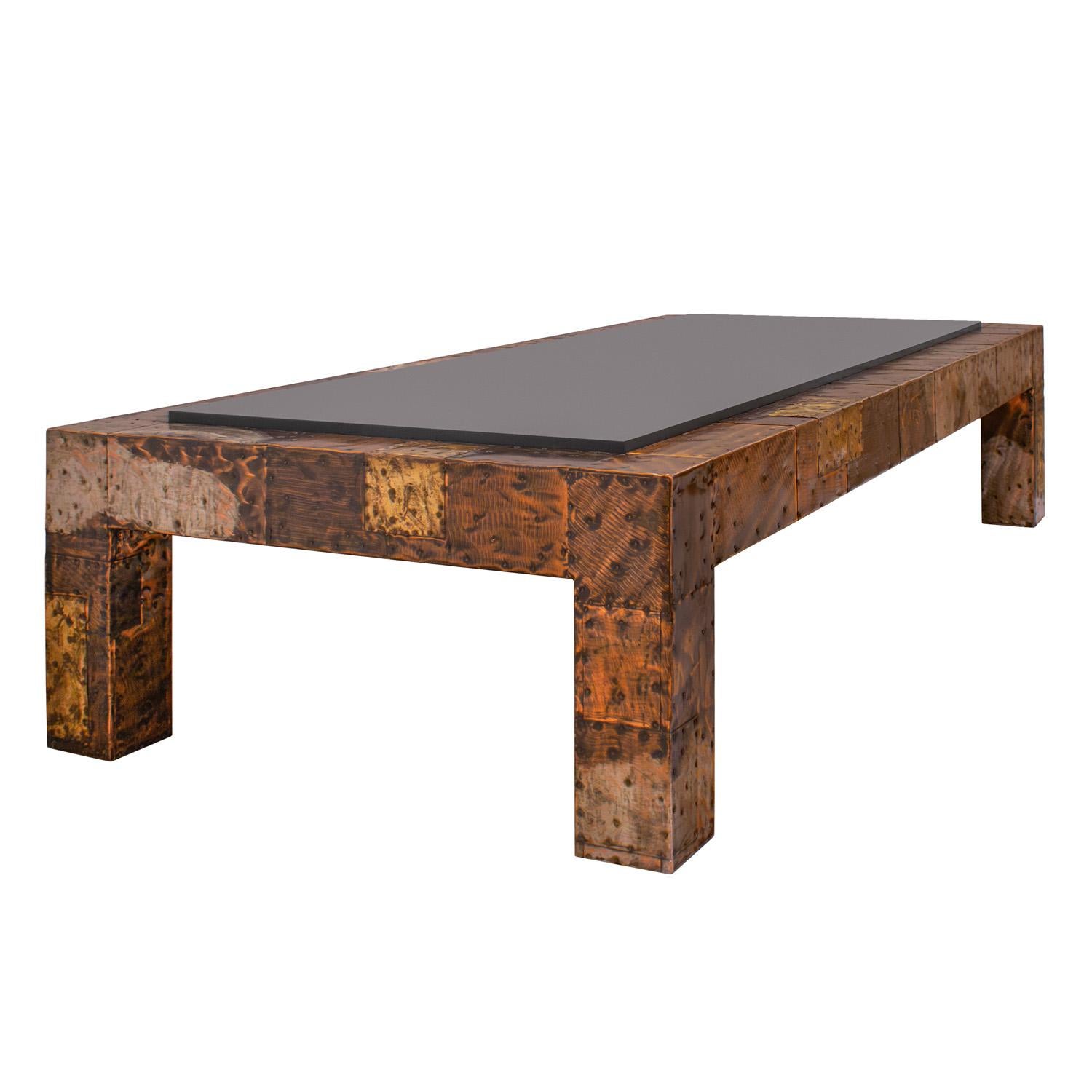 Superbly crafted Patchwork Coffee Table in welded and patinated pewter, copper, steel, and bronze with inset lacquered wood top top by Paul Evans, American, circa 1969. This table was typically made with a slate top.  The variation in texture, tone,