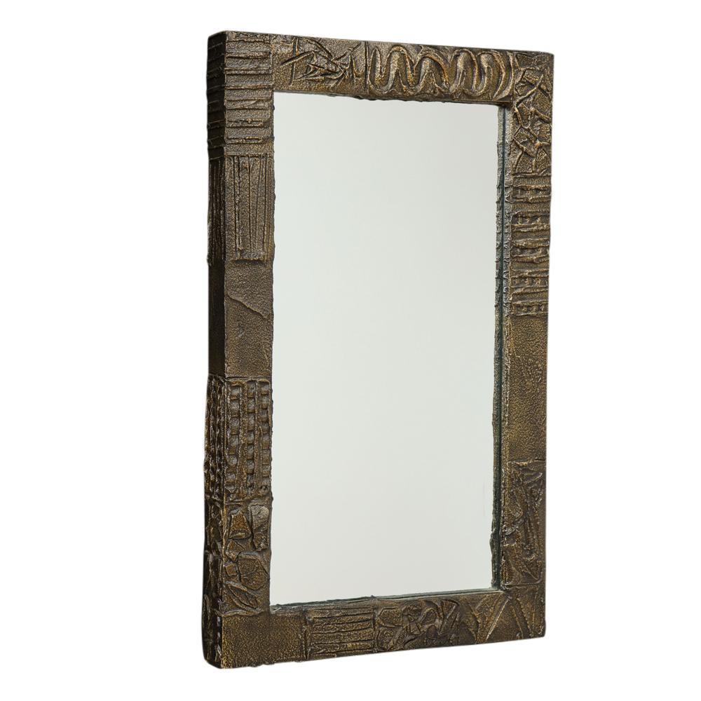 Paul Evans mirror, sculpted bronze and resin, signed. Large scale rectangular mirror decorated by hand with modernist abstract incising and relief. Signed on the top edge: 