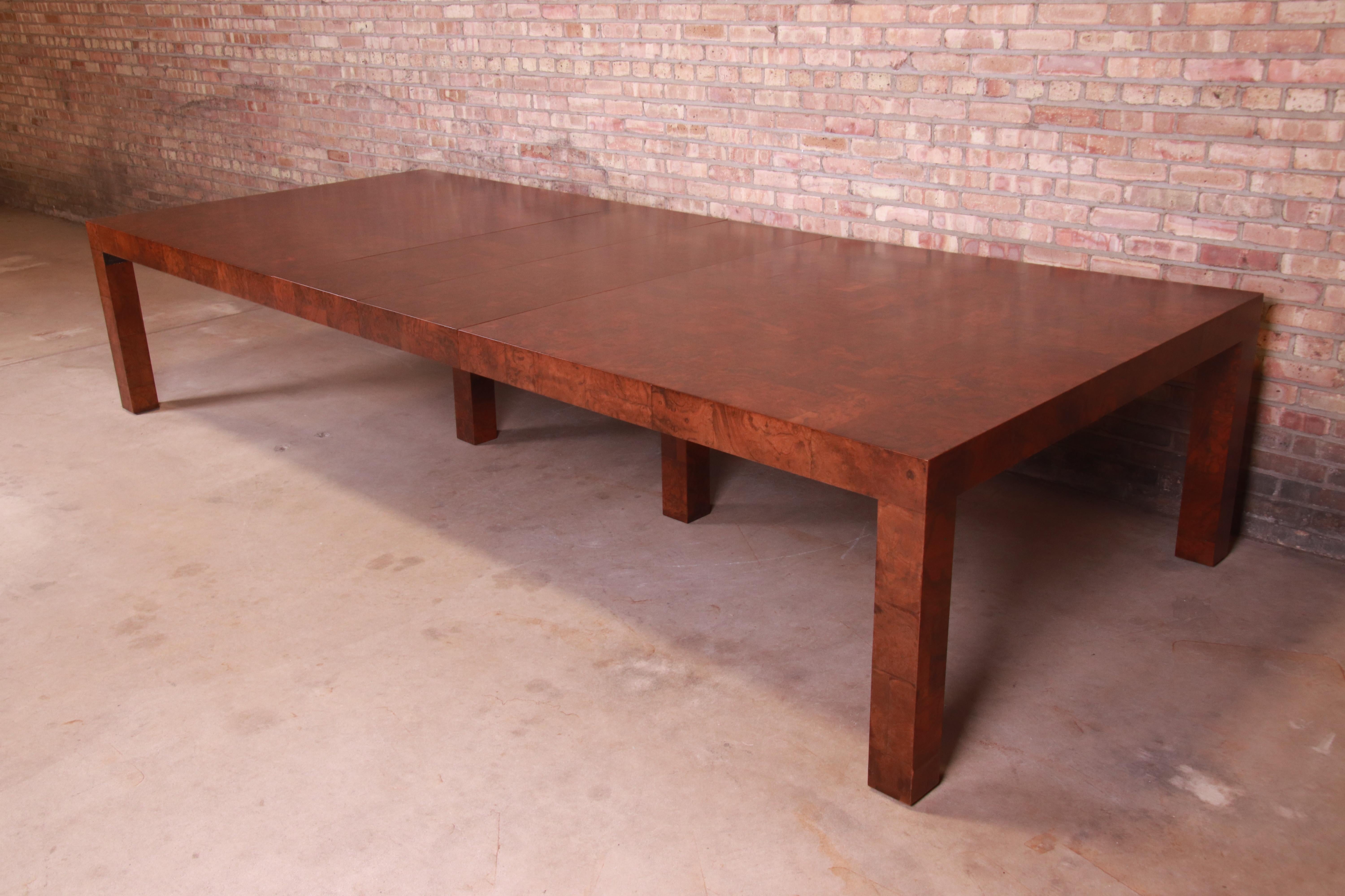 A rare and exceptional custom monumental Mid-Century Modern Parsons extension dining table or conference table

By Paul Evans for Directional, 