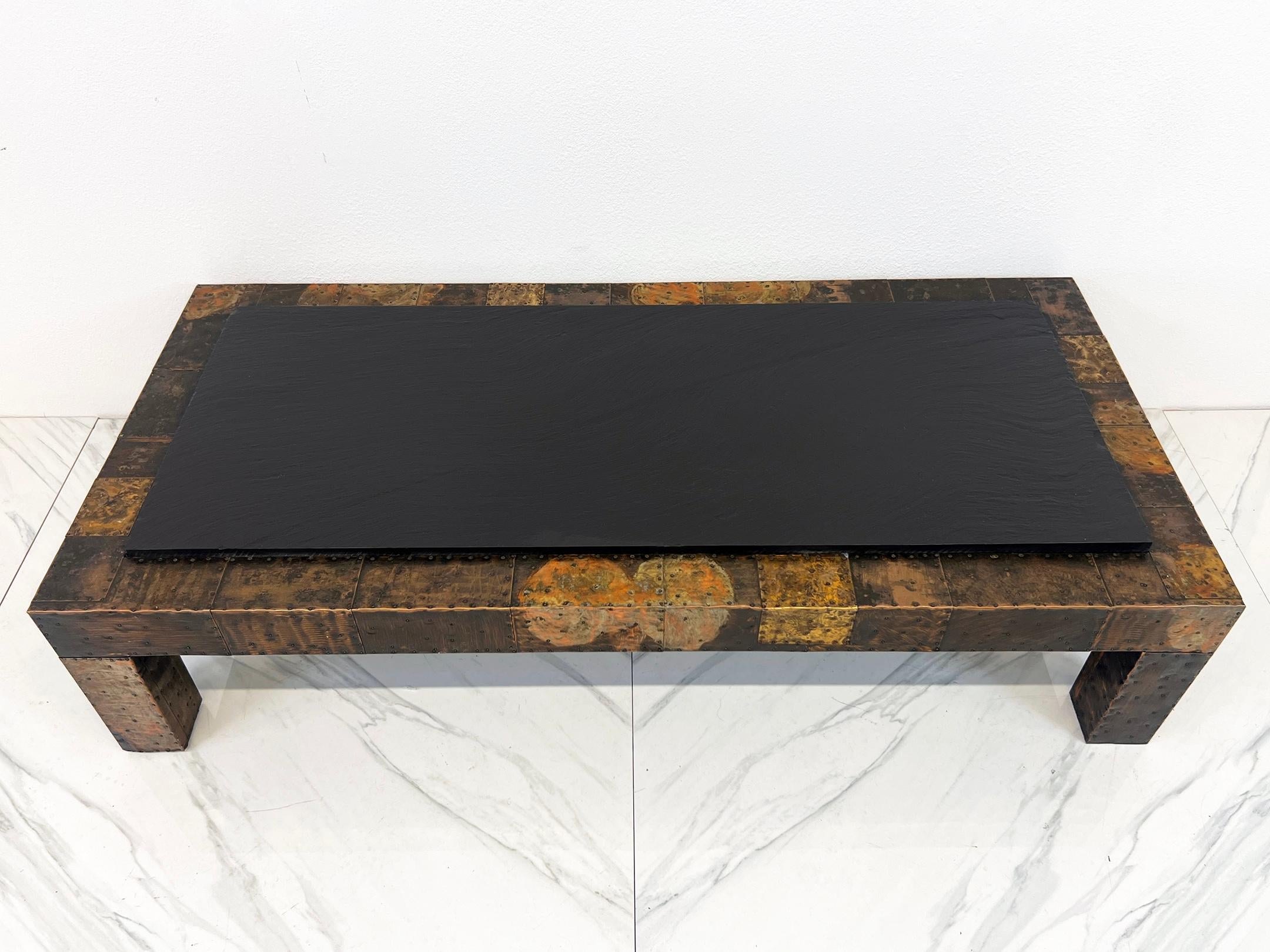 Looking for a coffee table that’s more than just furniture-- well this is a functional work of art. This Paul Evans original is a stunning example of mid-century artistry with a flair for the unconventional. Handcrafted from a mesmerizing patchwork