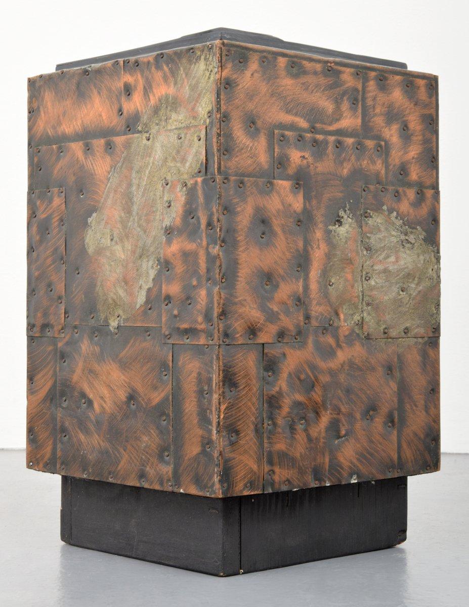 Patchwork cube side/end table by Paul Evans (American, 1931-1987) for Paul Evans Studio for Directional. Reference (technique): Paul Evans Designer & Sculptor, Jeffrey Head, pg. 68. 

Materials: patinated copper-steel, slate, wood.