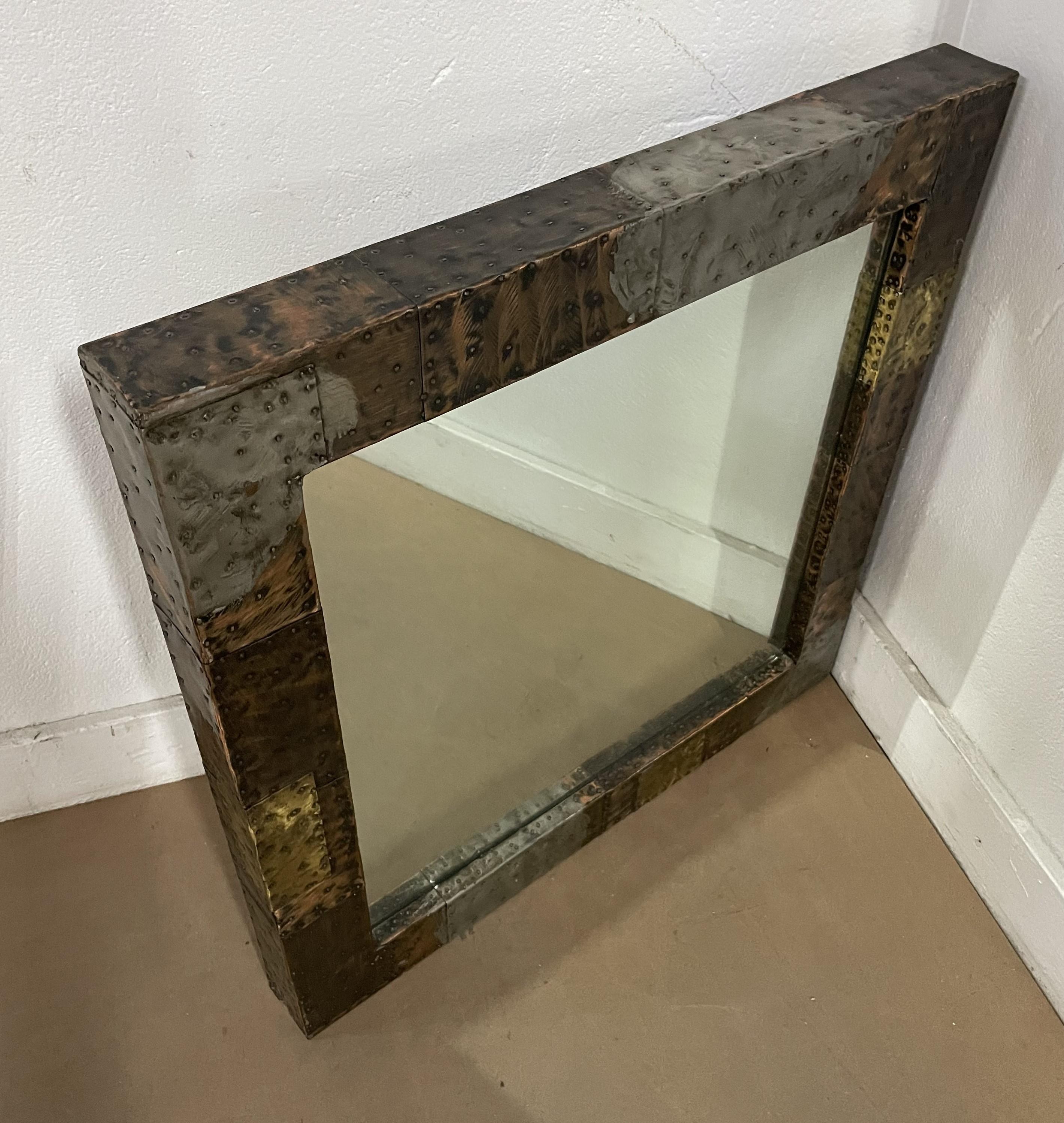Vintage Paul Evans Patchwork mirror and matching shelf or console with slate top. 
Shelf measures: 6 x 42 x 13. Mirror measures: 30 x 30.