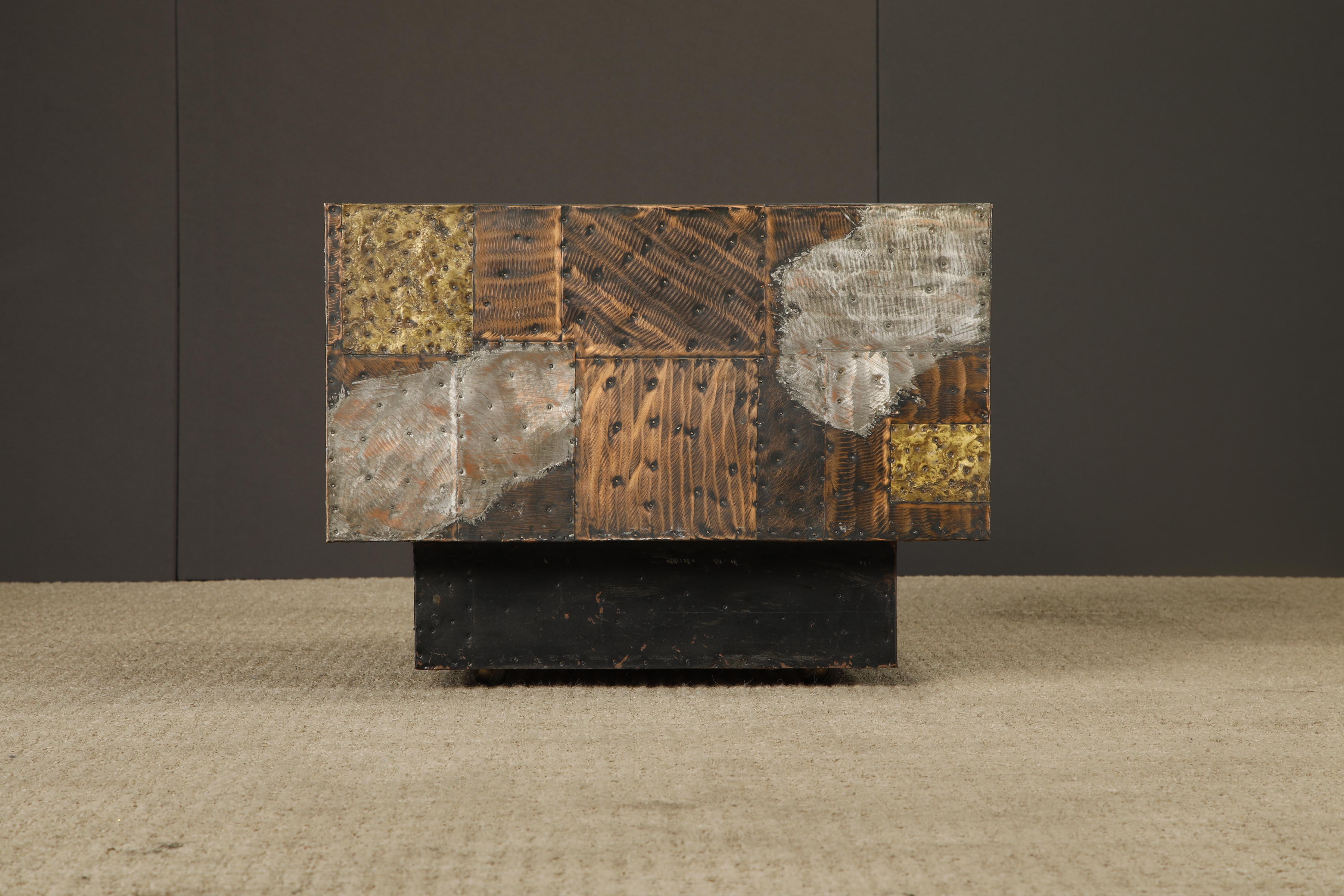 Stunning 'PE-31' patchwork copper table by Paul Evans for Directional, produced in circa 1967. The cube shaped form is fabricated from patinated pieces of copper, bronze, and pewter which have been welded and nailed in a patchwork style pattern