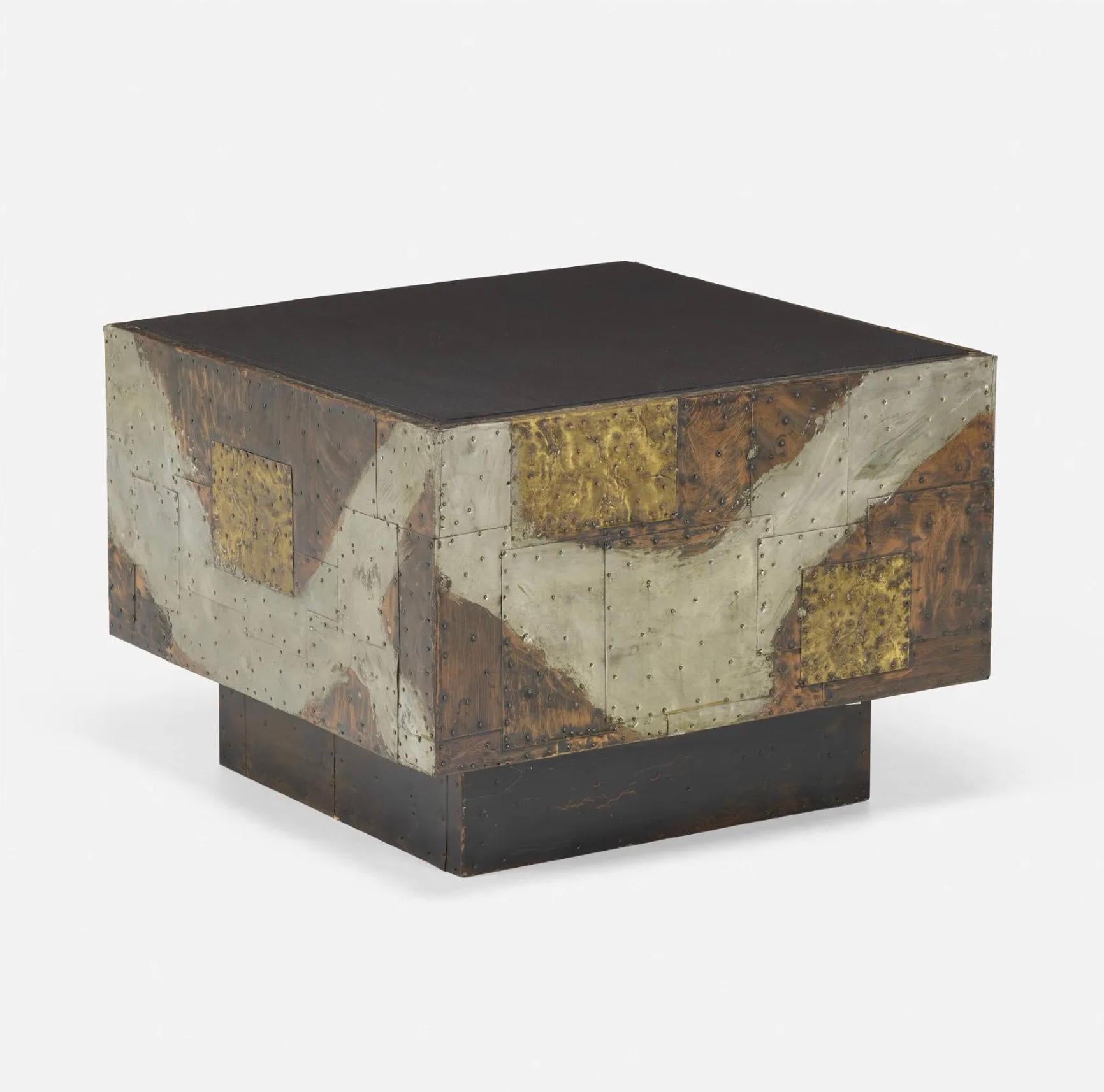 Stunning 'PE-31' patchwork copper table by Paul Evans for Directional, produced in circa 1967. The cube shaped form is fabricated from patinated pieces of copper, bronze, and pewter which have been welded and nailed in a patchwork style pattern