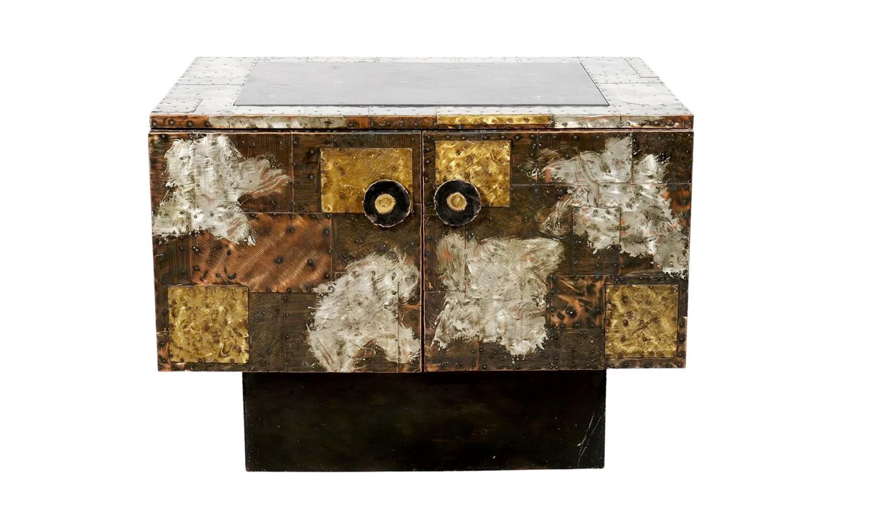 Stunning 'PE-32' copper clad bar cabinet on casters by Paul Evans for Directional, produced in 1968 per original receipt which we have a copy of and will provide to the buyer upon sale. This incredible piece of design history is fabricated from