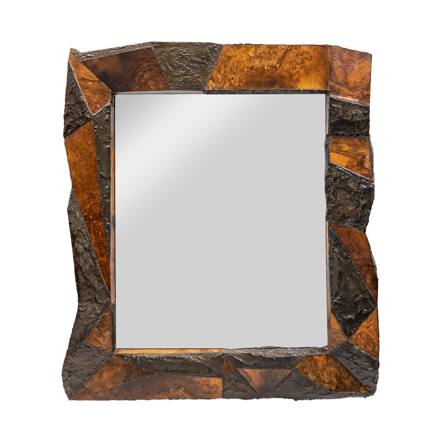 Rare and unique sculptured  mirror in bronze resin and walnut burl by Paul Evans, American 1975. Comes with original cleat marked “PE - 908.” We have not seen any other mirror like this one. The original owner purchased this with a wall-mount Paul