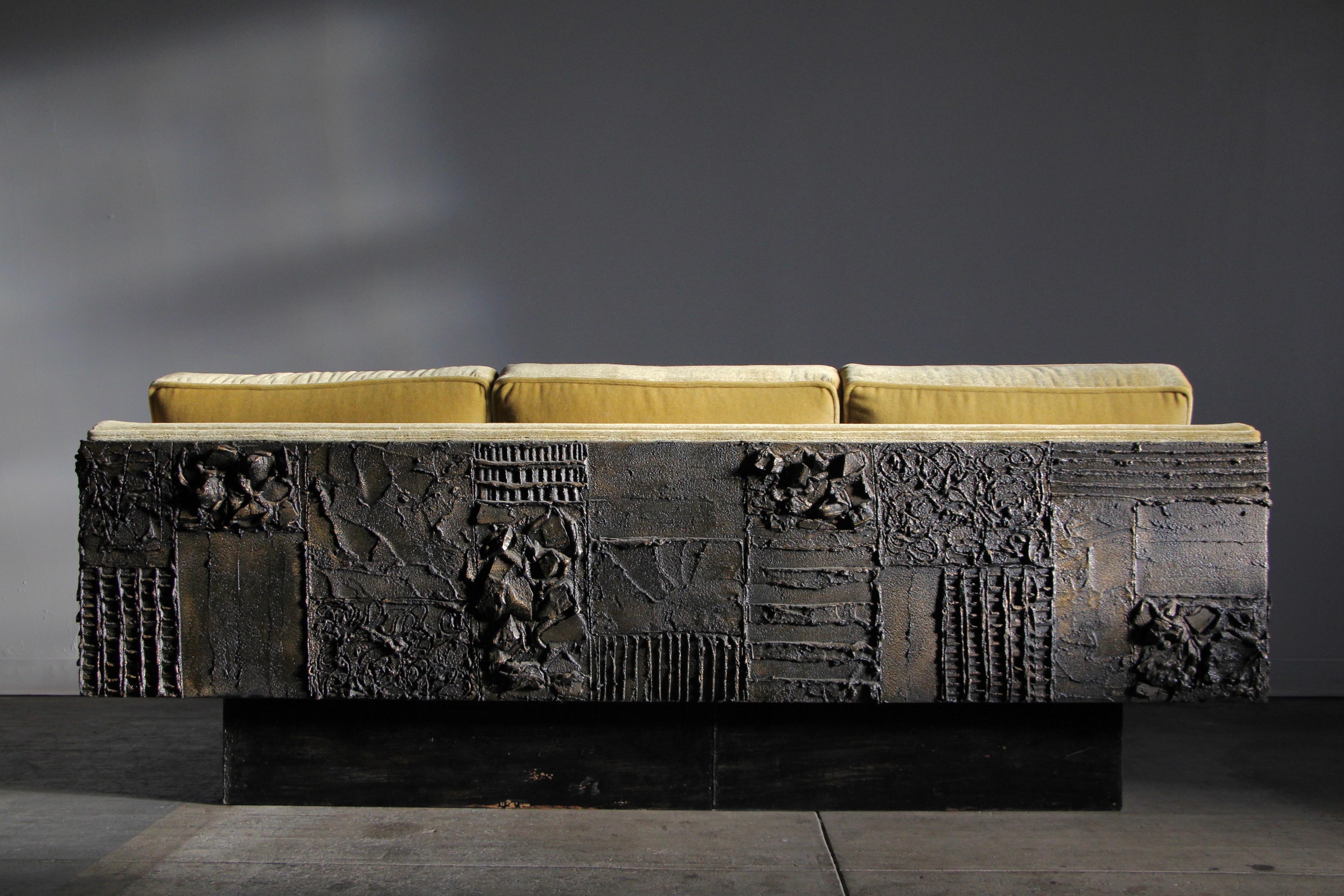 Here's a piece for all the Paul Evans collectors out there. This sensational, sculpted bronze sofa came from the original owners who custom ordered the piece through Directional Furniture in 1969. 

These 
