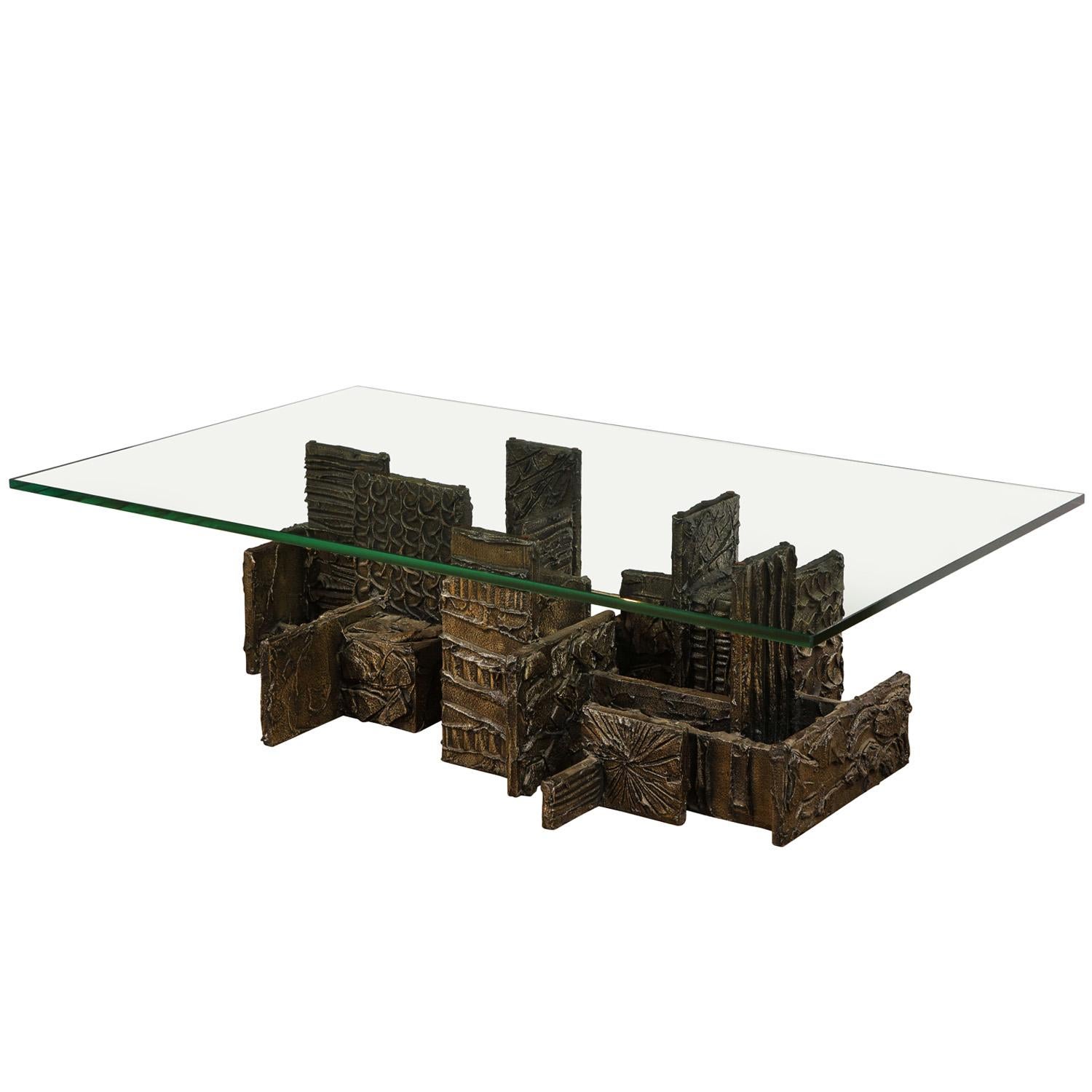 Rare “Skyline” design, sculpted bronze coffee table, model PE-131 with thick glass top by Paul Evans, American 1969 (signed “PE 69” on front). 
An iconic Paul Evans work of art. 

Dimensions of the base are. 
W: 49 inches
D: 30 inches
H: 15