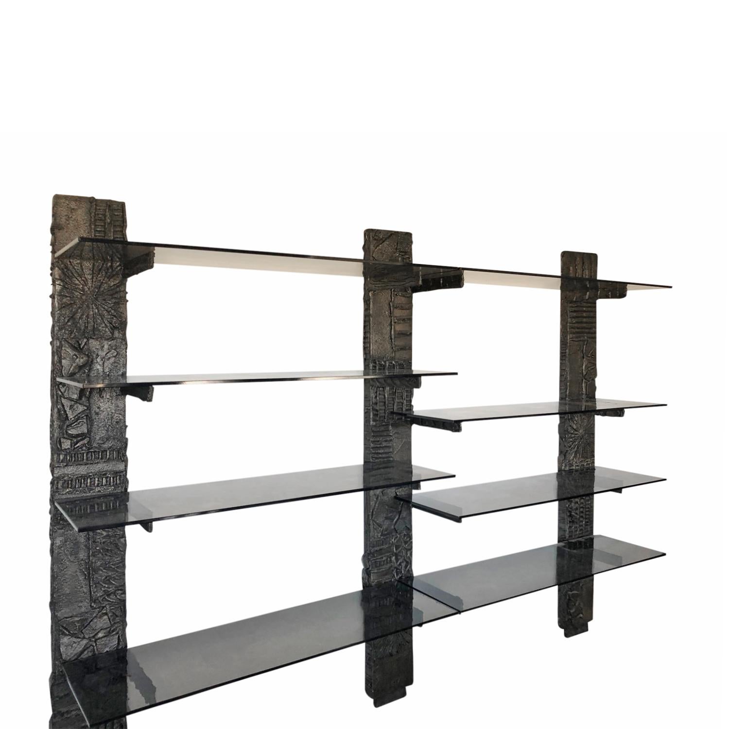 Wall unit in sculpted bronze resin with smoked glass shelves by Paul Evans, American, 1967 (signed 