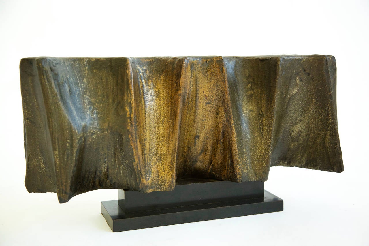 Evans Studio rare bronze resin sculpture.
This sculpture executed in 1965 before the resin furniture line was introduced, when the studio was experimenting with resin applied materials.
This sculpture is from an Evans employee from New Hope P.A.