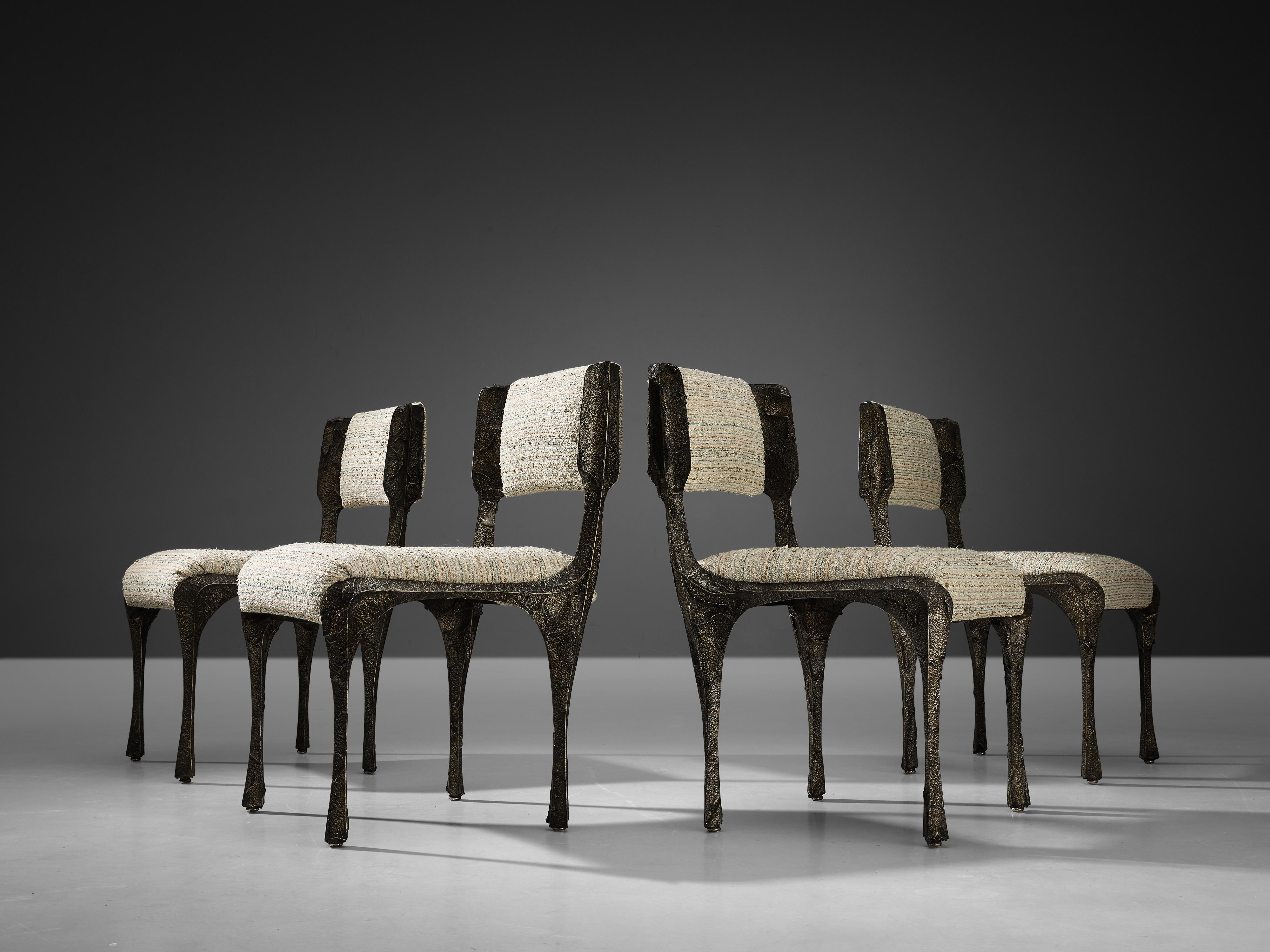 Paul Evans for Directional, dining chairs from the series PE-105/106, sculpted bronze, steel, fabric, United States, circa 1965 
 
Stunning example of Paul Evans designs for Directional. The bronze series PE100-200 was the bestselling bronze