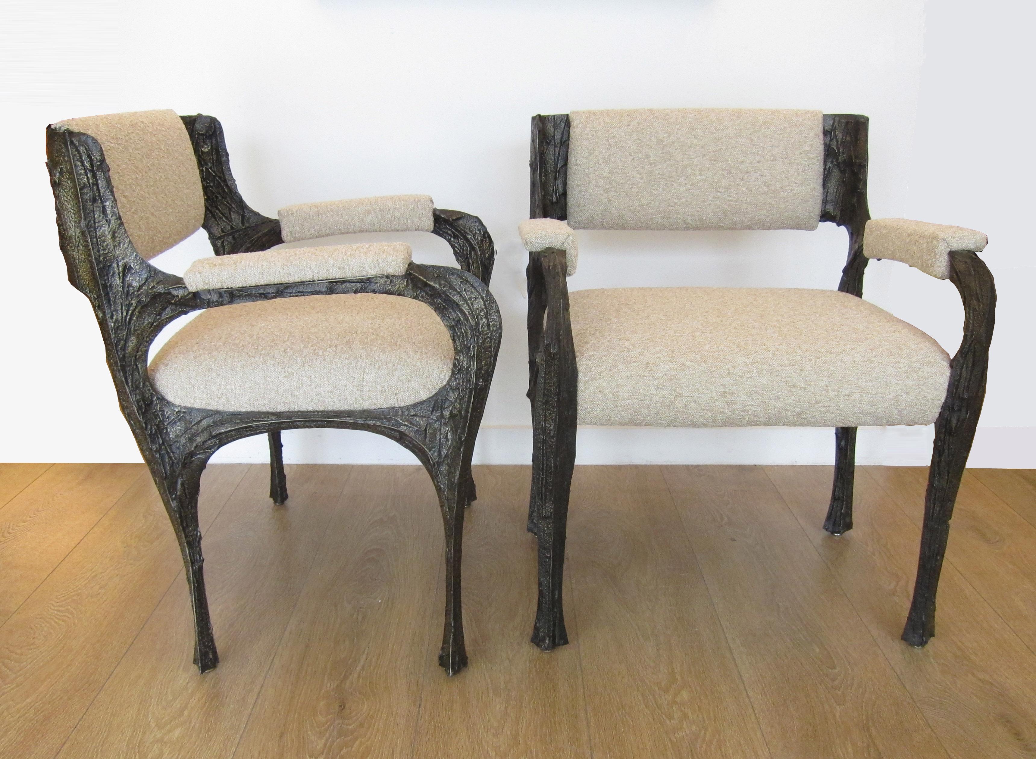 Paul Evans set of twelve brutalist sculpted bronze dining chairs. This extremely rare to find set is comprised of two armchairs (Model PE 105) and ten side chairs (Model PE 106).
Newly upholstered with a heavy bouclé fabric.
References and