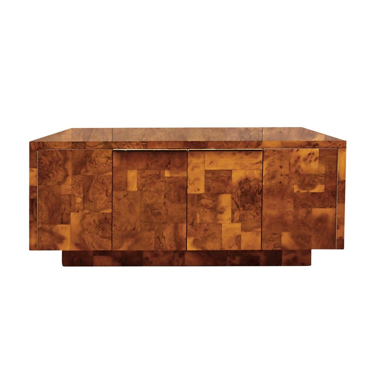4 Door credenza with bi-fold doors in tessellated walnut burl with adjustable shelves in interior by Paul Evans for Directional Furniture, American 1973. This piece has felt lining on the interior of the right door and on the shelf, perfect for
