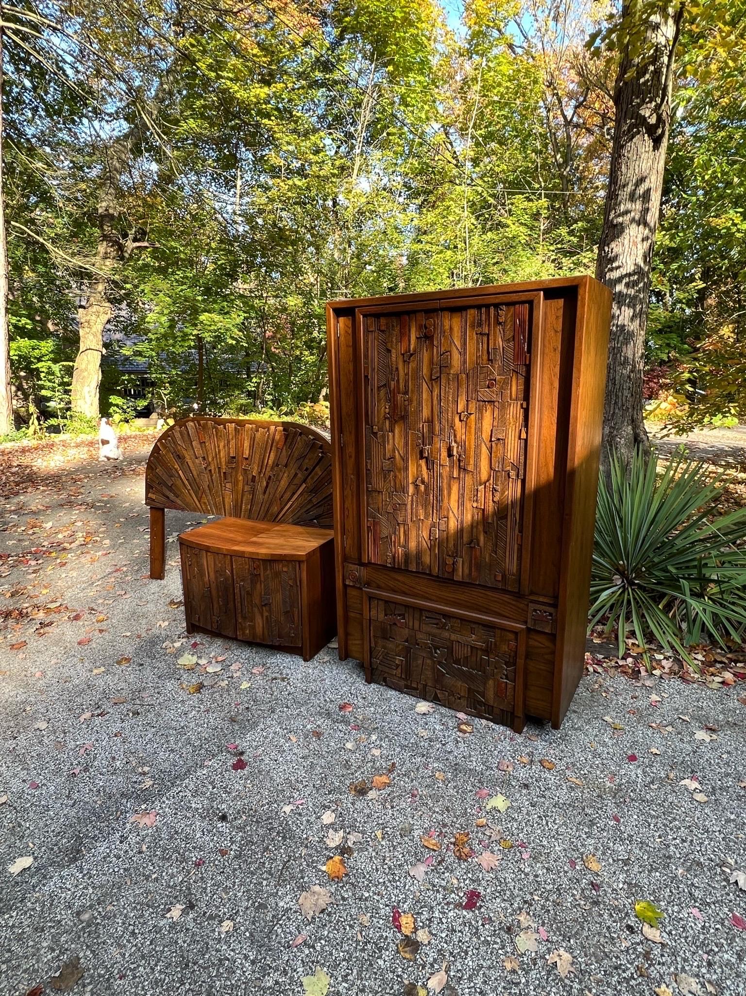 Mid Century Modern Paul Evans style Brutalist bedroom set from Lane Pueblo collection. The set includes an armoire, headboard and a nightstand.

This collection is a stand out known for the intricately laid, highly textured pattern adorning the