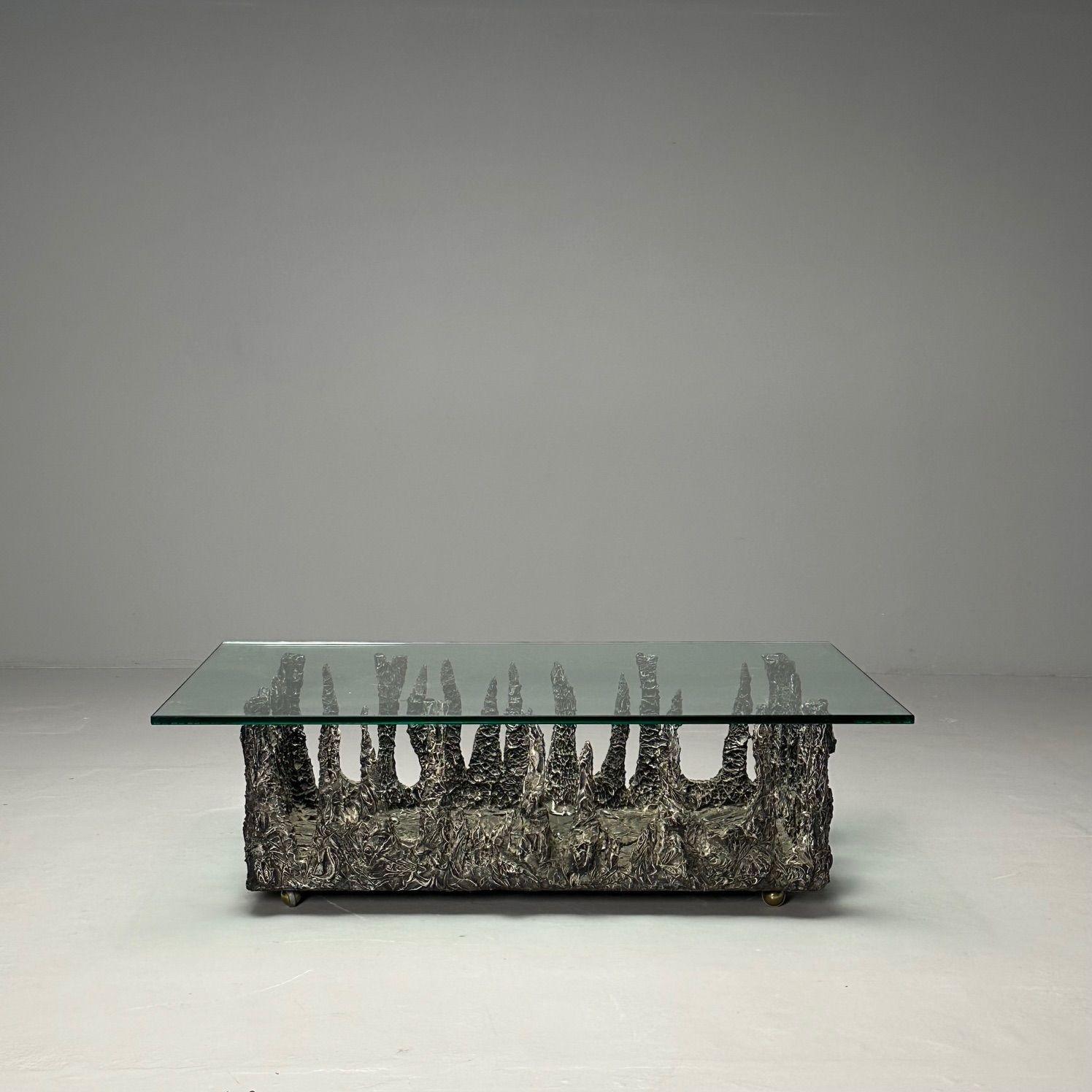 Paul Evans Style, Brutalist Mid-Century Modern, Rectangular Coffee Table, Wood

Modern coffee table having a brutalist carved wooden base sitting on four casters. This work is highly similar stylistically to examples by renowned American designer,