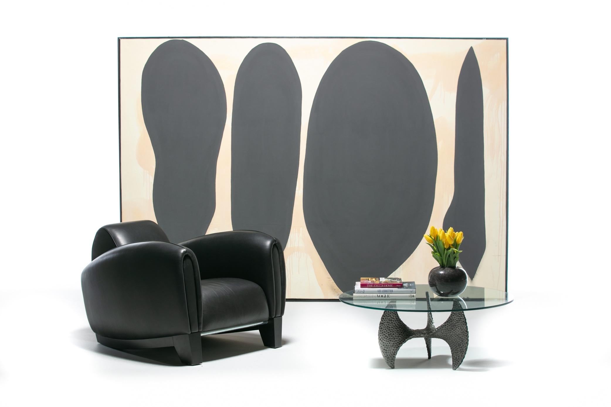 Organic dark shapes highlighted with brushed edges perfectly merge sculpture and texture in this Paul Evans style Brutalist Propeller coffee table. The shape and legs of the coffee table resemble a propeller, hence the reference, and is made of