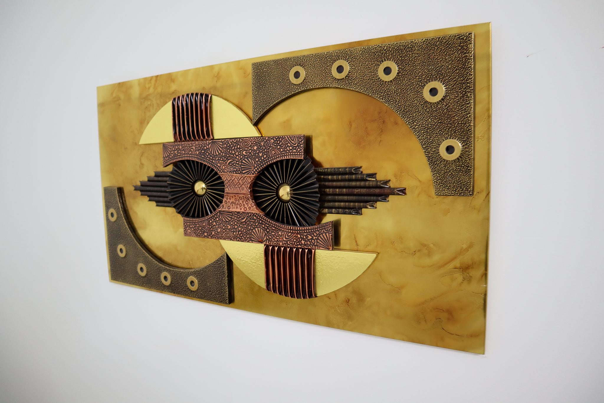 This Brutalist wall sculpture is inspired and in the style of sculptor Paul Avans made circa 1970, Europe. This abstract wall sculpture consist of tortured copper and brass in abstract shapes. The wall sculpture is affixed to a wood board clad made