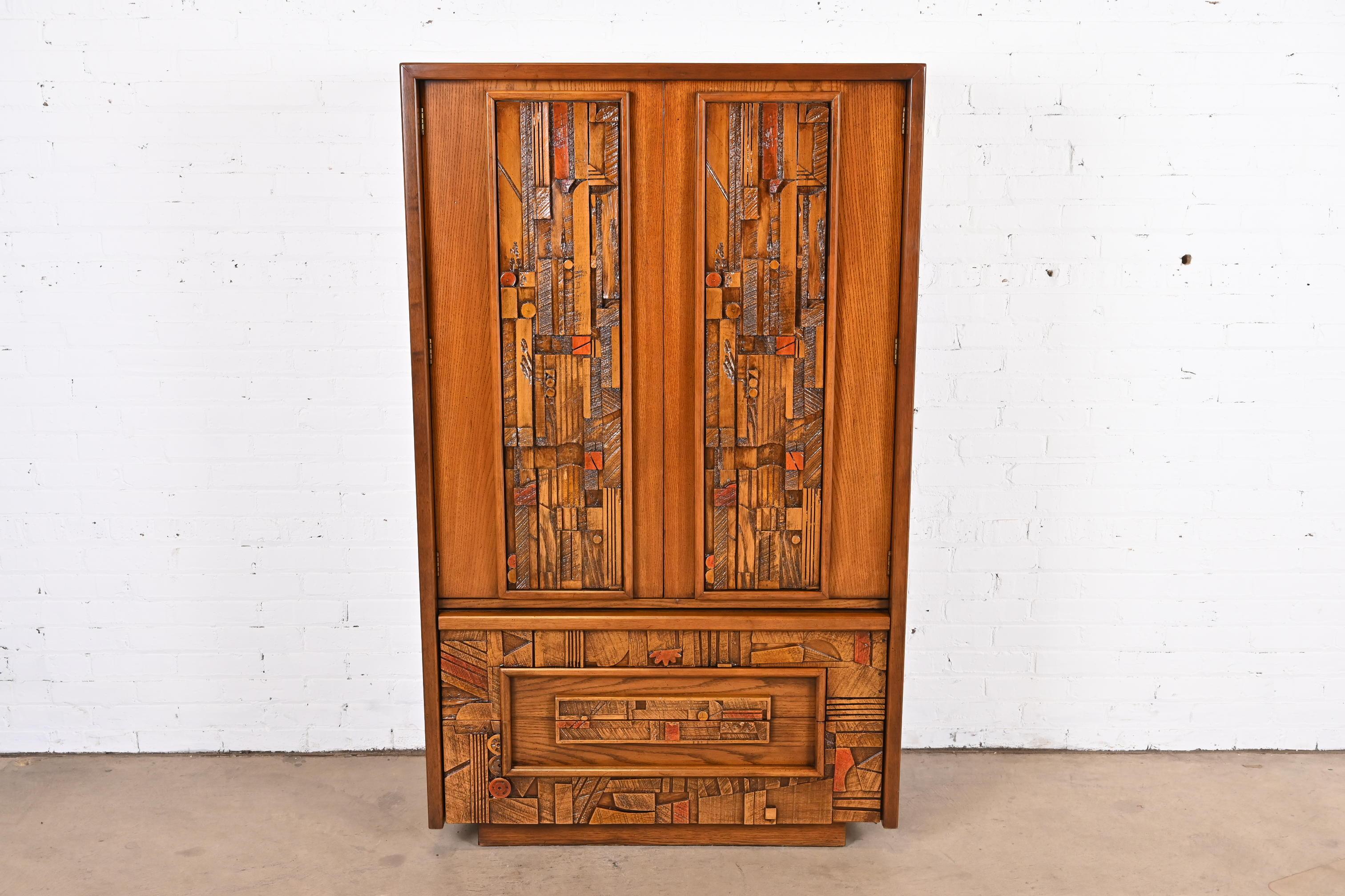 An exceptional Paul Evans style Mid-Century Modern brutalist oak armoire dresser

By Lane Furniture, 