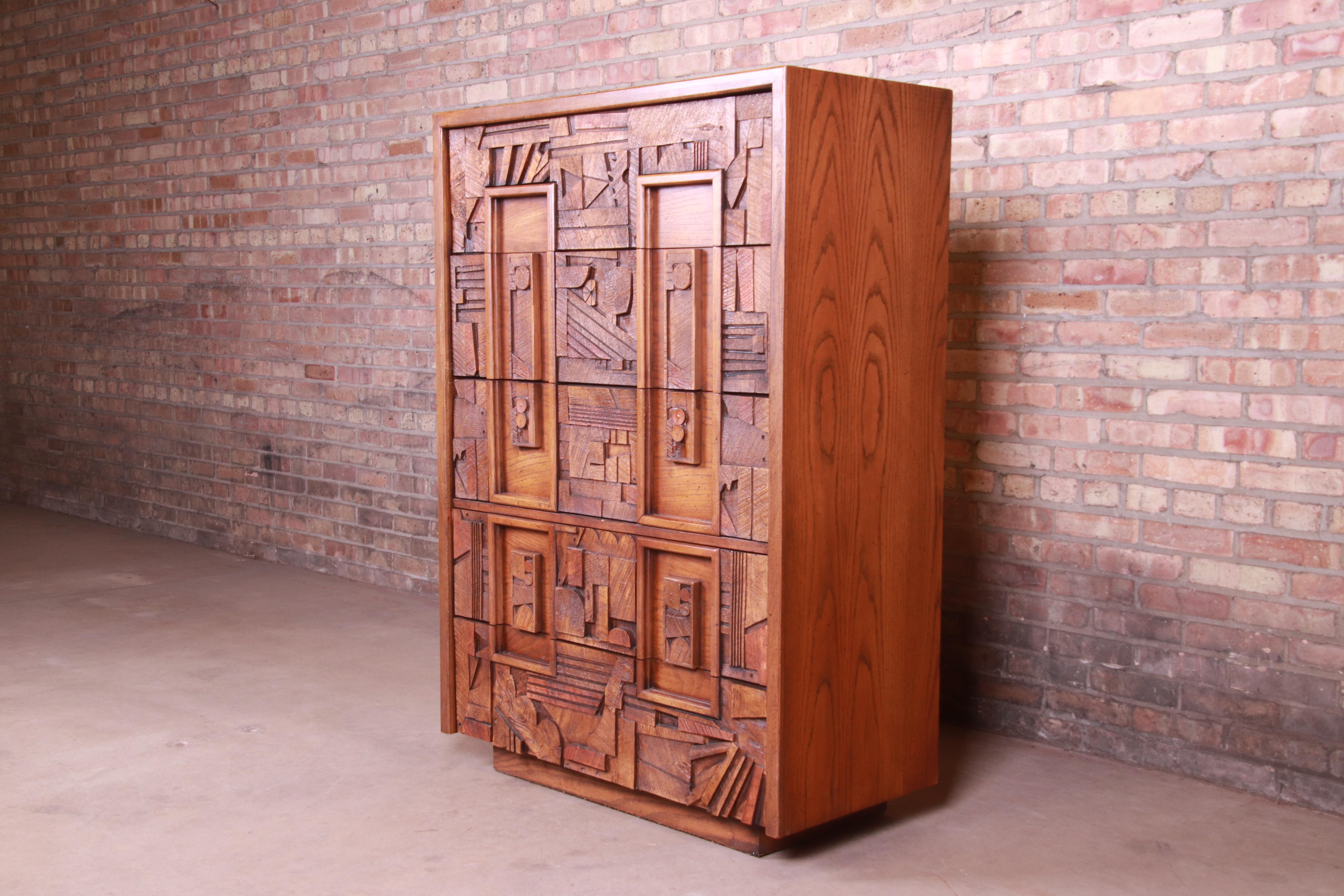 An exceptional Paul Evans style Mid-Century Modern Brutalist oak highboy dresser

By Lane Furniture 