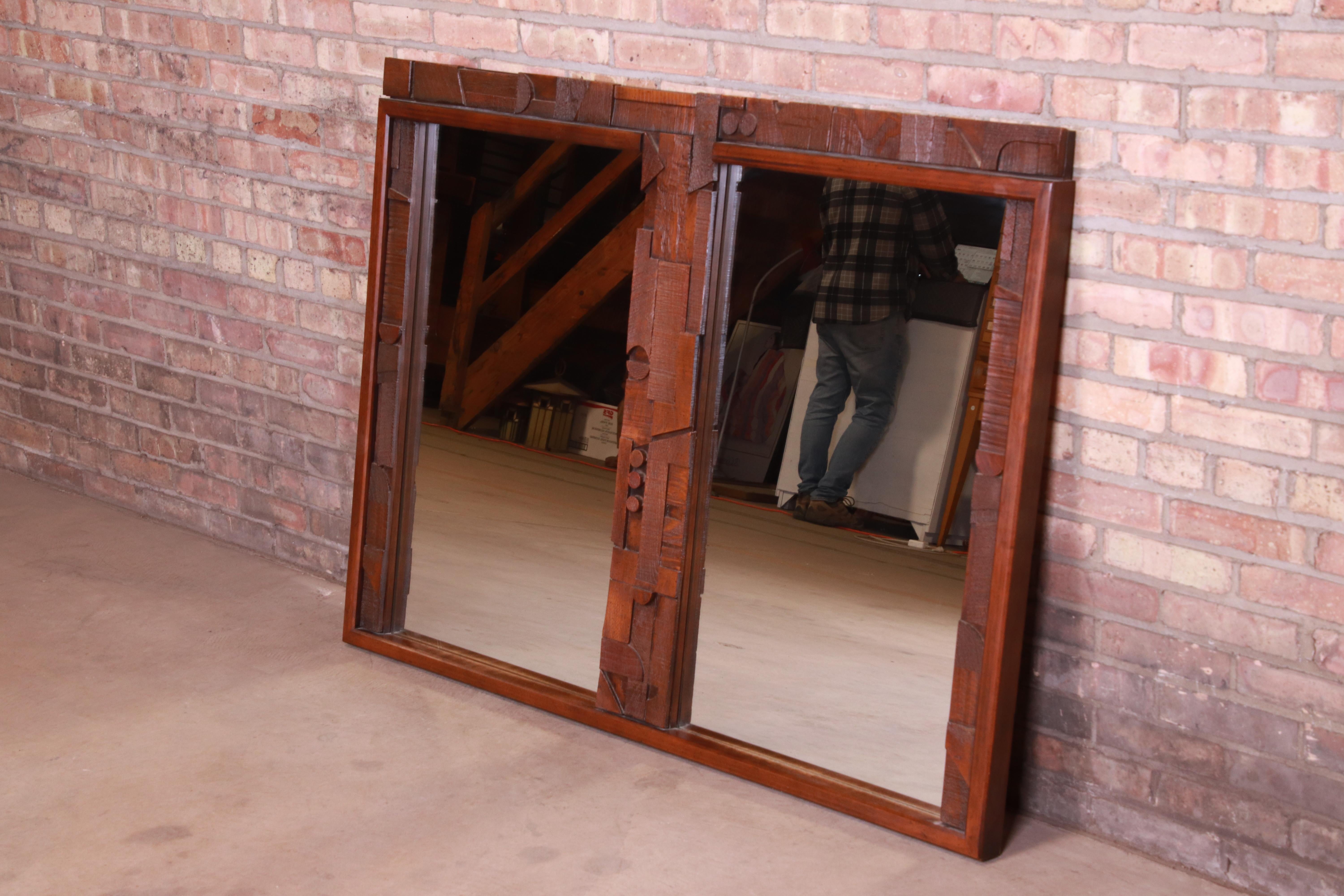 An exceptional Paul Evans style Mid-Century Modern Brutalist oak framed double mirror

By Lane Furniture 