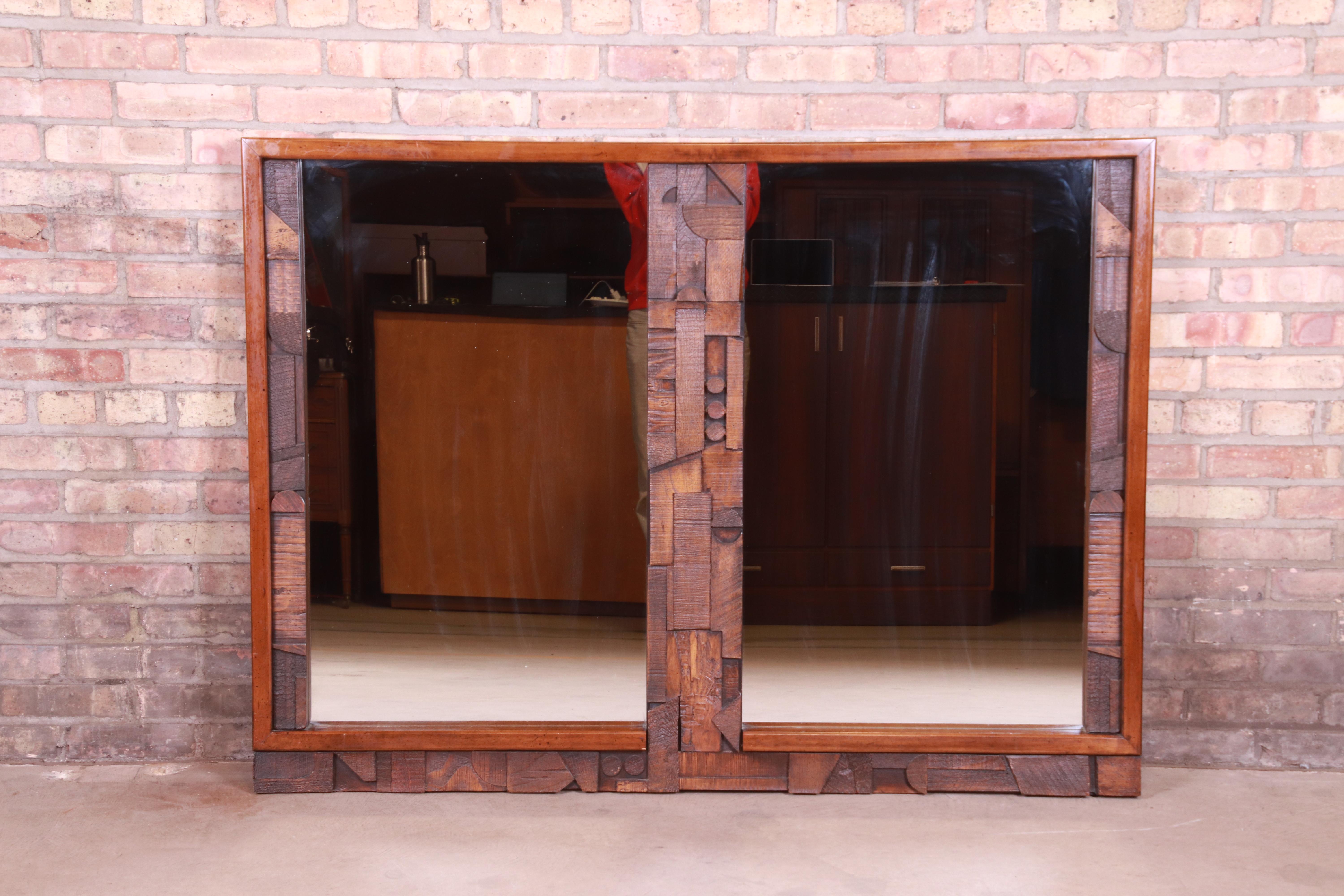 An exceptional Paul Evans style Mid-Century Modern Brutalist oak framed double mirror

By Lane Furniture 