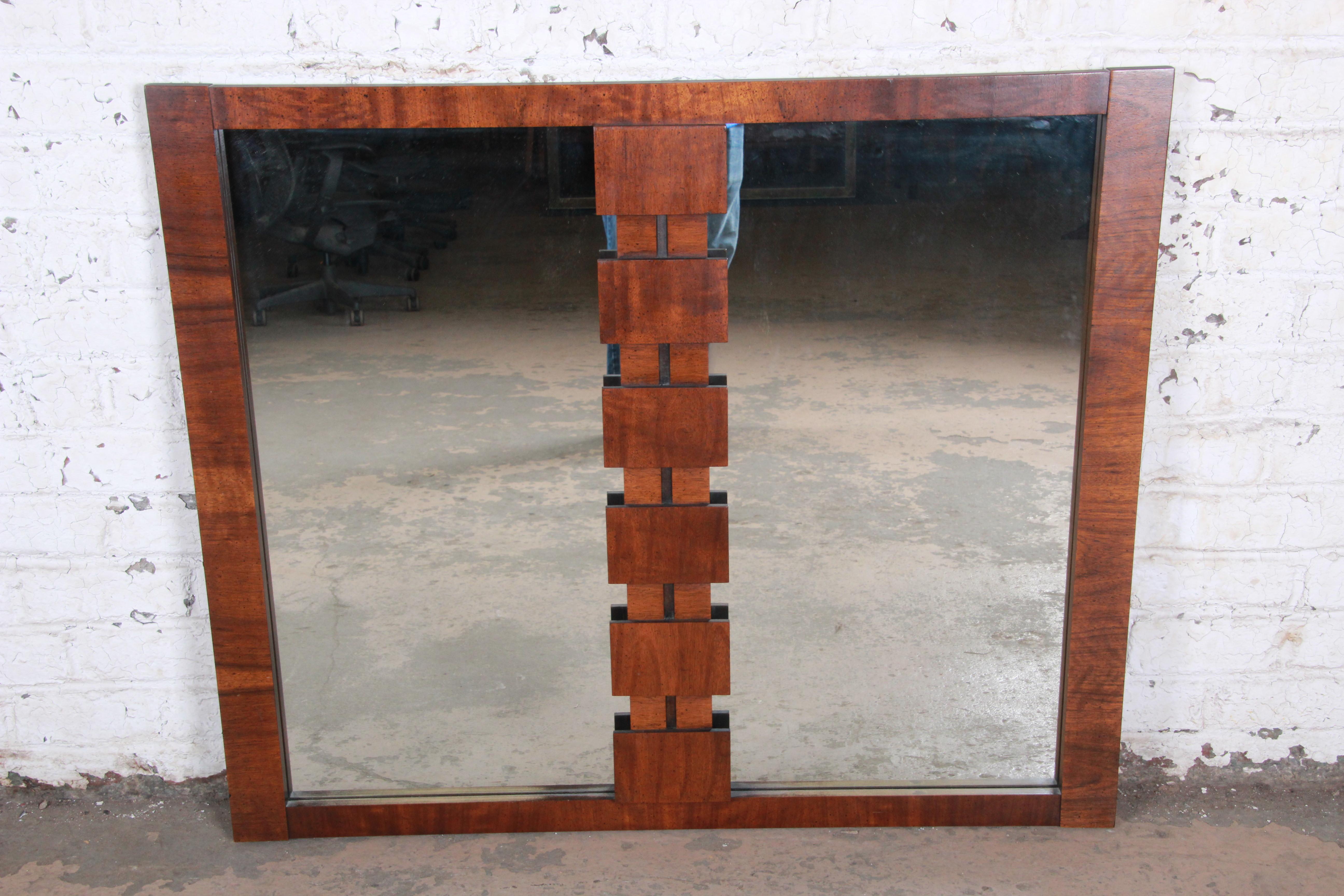 A gorgeous Paul Evans style Mid-Century Modern brutalist walnut double mirror

By Lane Furniture 