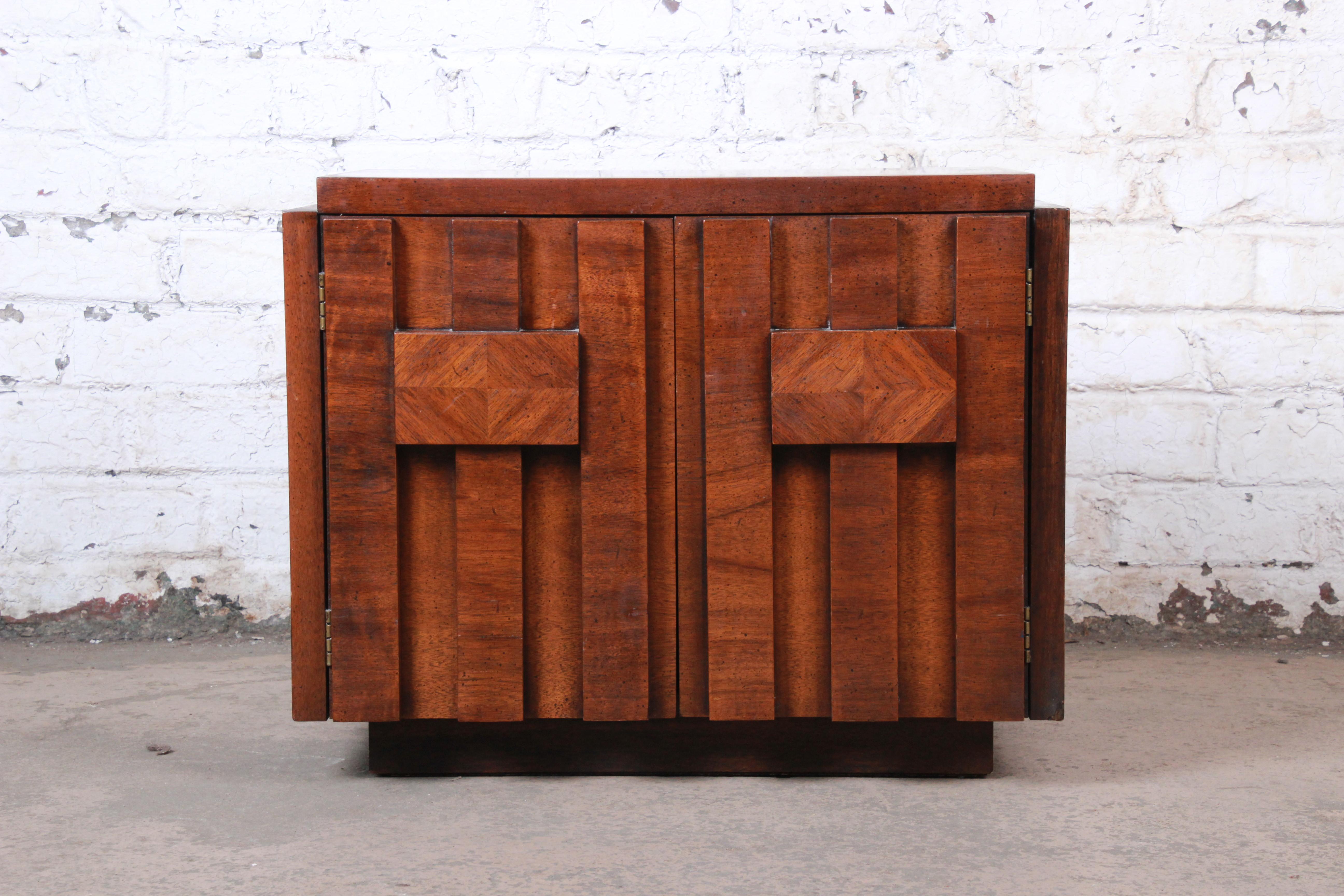 A gorgeous Paul Evans style Mid-Century Modern Brutalist walnut nightstand or side table

By Lane Furniture 