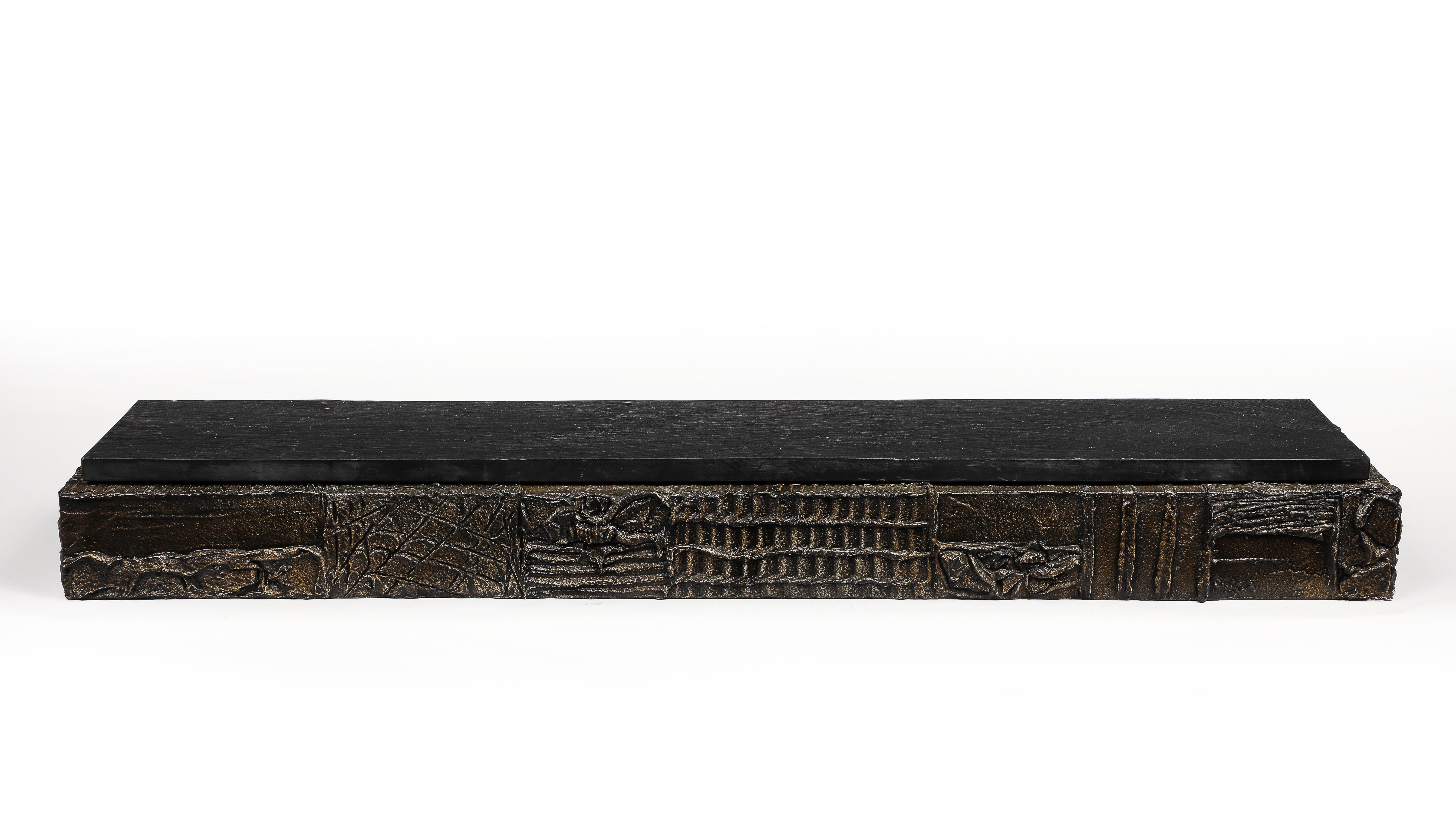 Paul Evans Wall-Hanging Console, Sculpted Bronze, Slate, Signed. In original condition and purchased from the original owner. Large scale chunky wall mounted shelf, finished dark in bronzed resin and decorated with abstract designs. A large piece of