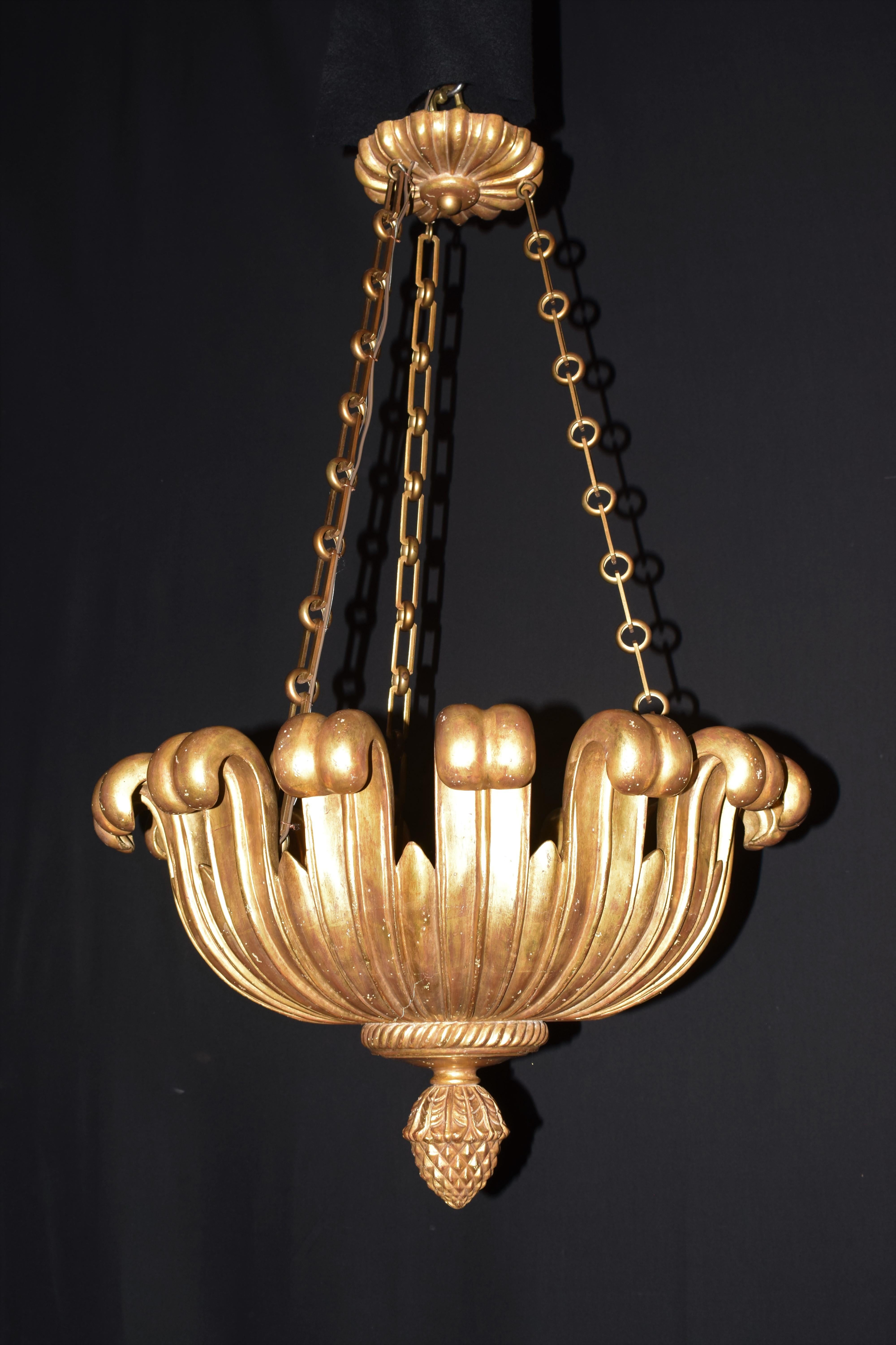A very elegant & decorative neoclassical bronze & giltwood pendant.
Europe Circa, 1990. 3 lights.
Dimensions: Height 40