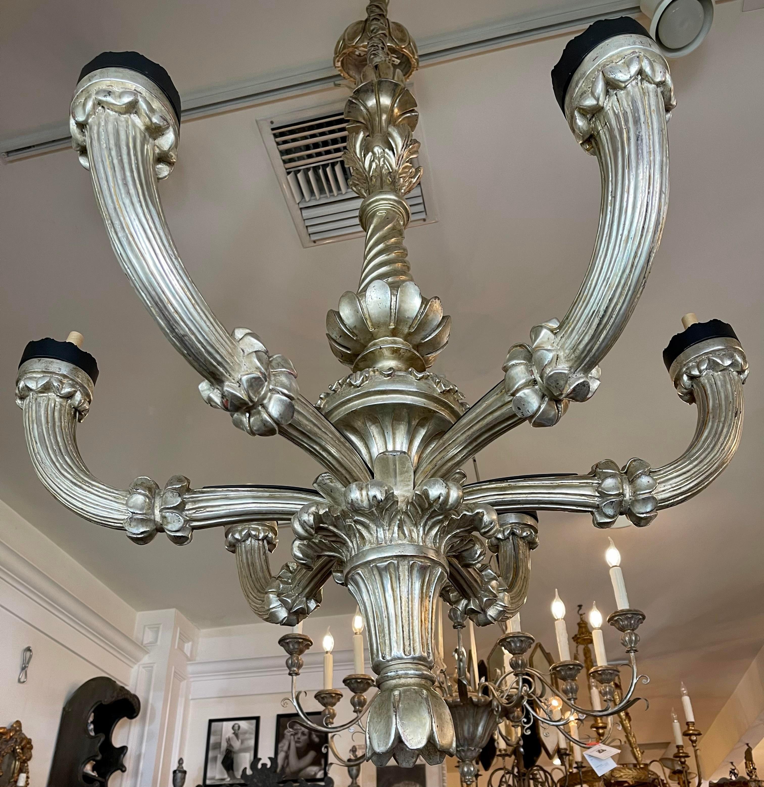 Paul Ferrante celestial 6 arm giltwood chandelier.