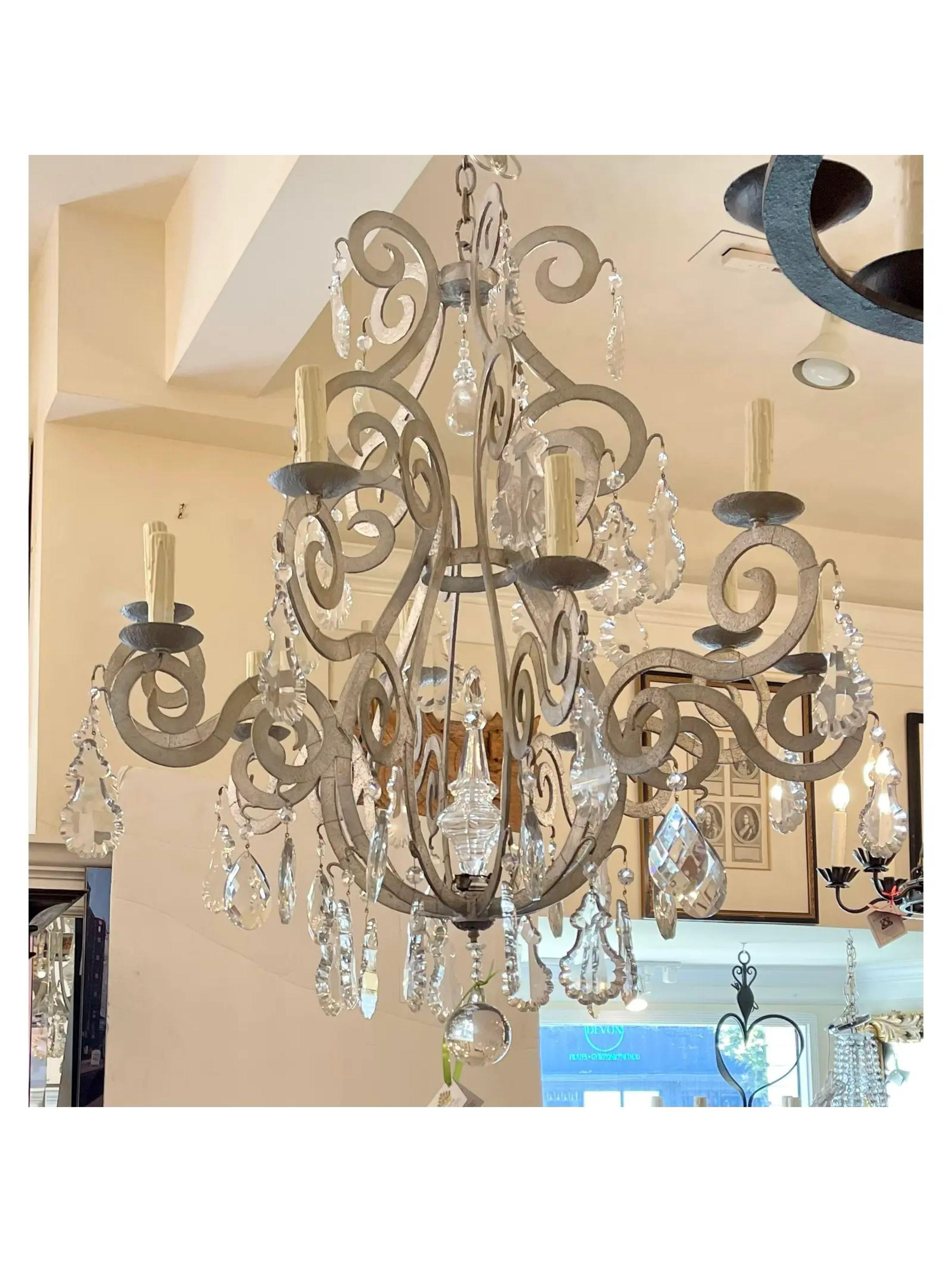Paul Ferrante Silver Metal & French Crystal Chandelier. Featuring a rock crystal peat as the upper centerpiece and thick high quality French crystals throughout.

Additional information: 
Materials: Crystal, Silver
Color: Silver
Brand: Paul