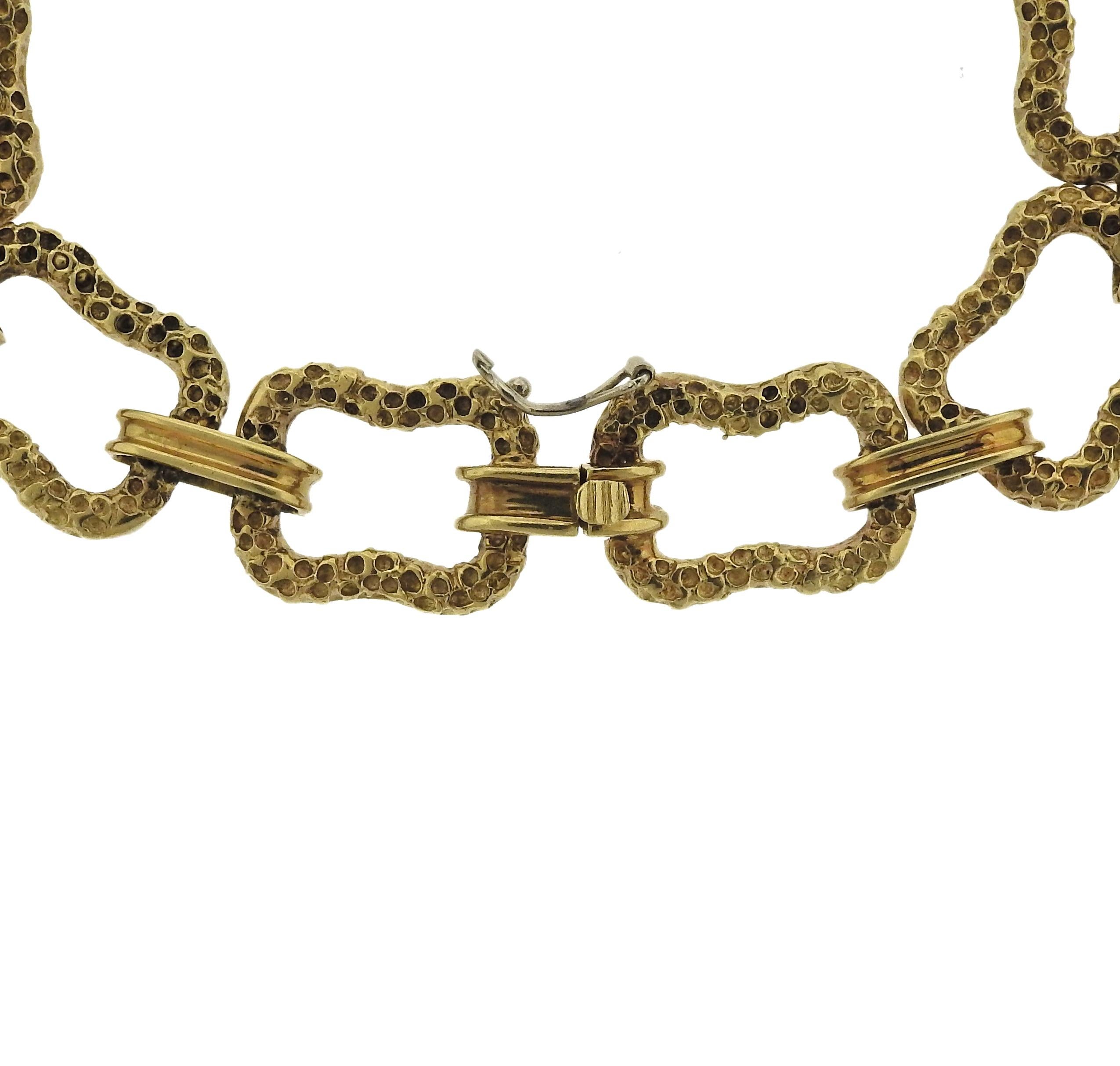 Long 18k gold link necklace, crafted by Paul Flato in circa 1970s. Necklace is 30