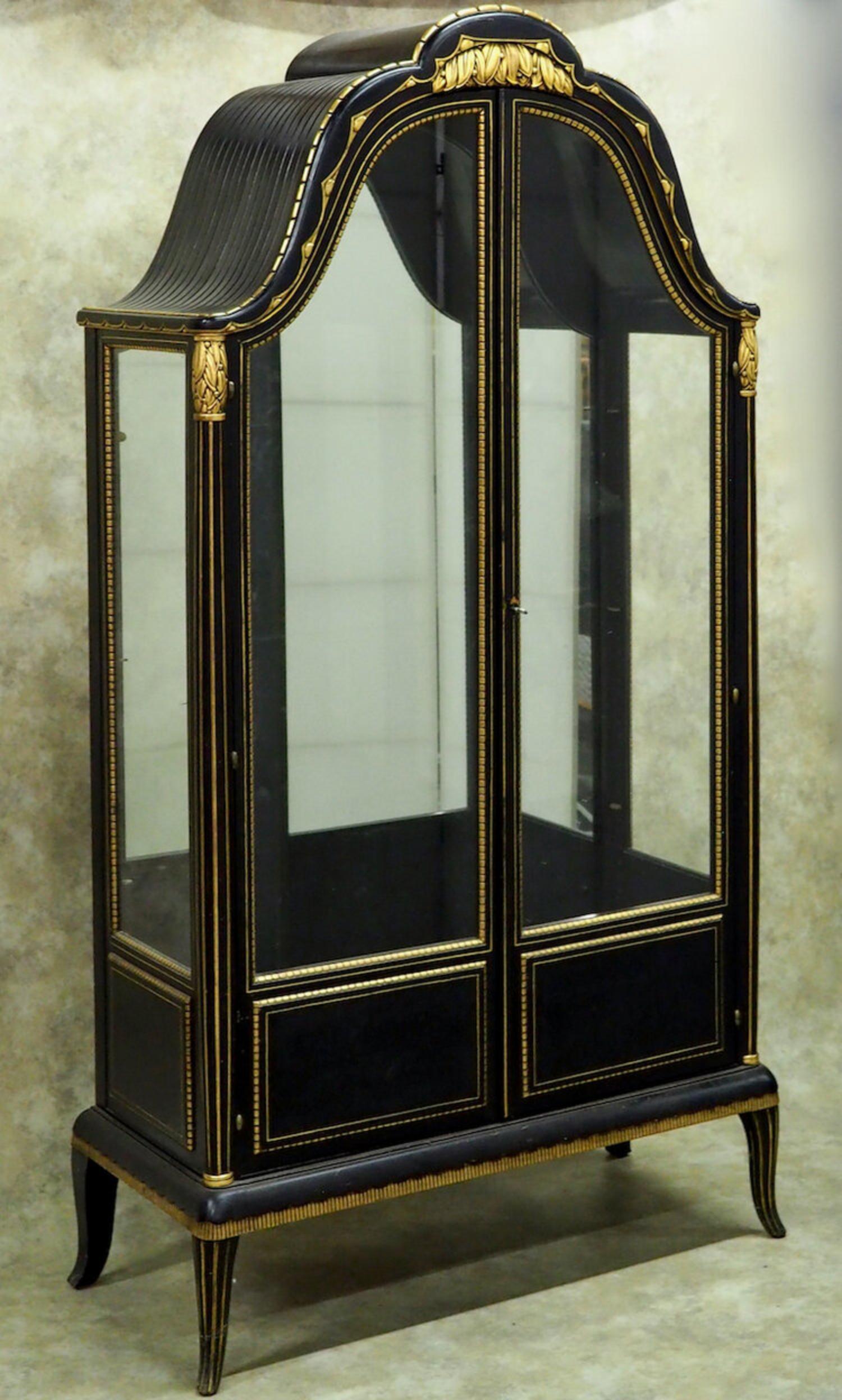 Early Classic Art Deco display cabinet/vitrine by Paul Follot, circa 1918, in original blue/black lacquer and with original gilding. This exquisite cabinet is a masterpiece of sculpting and detail in exceptional original condition. 40” wide x 18”