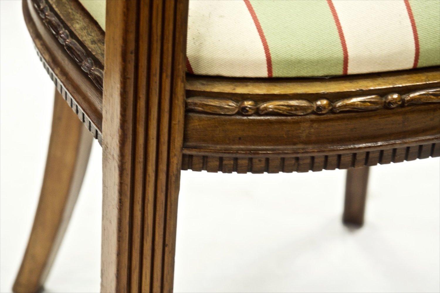 Art déco Quatre fauteuils en bois de rose sculpté Paul Follot en vente