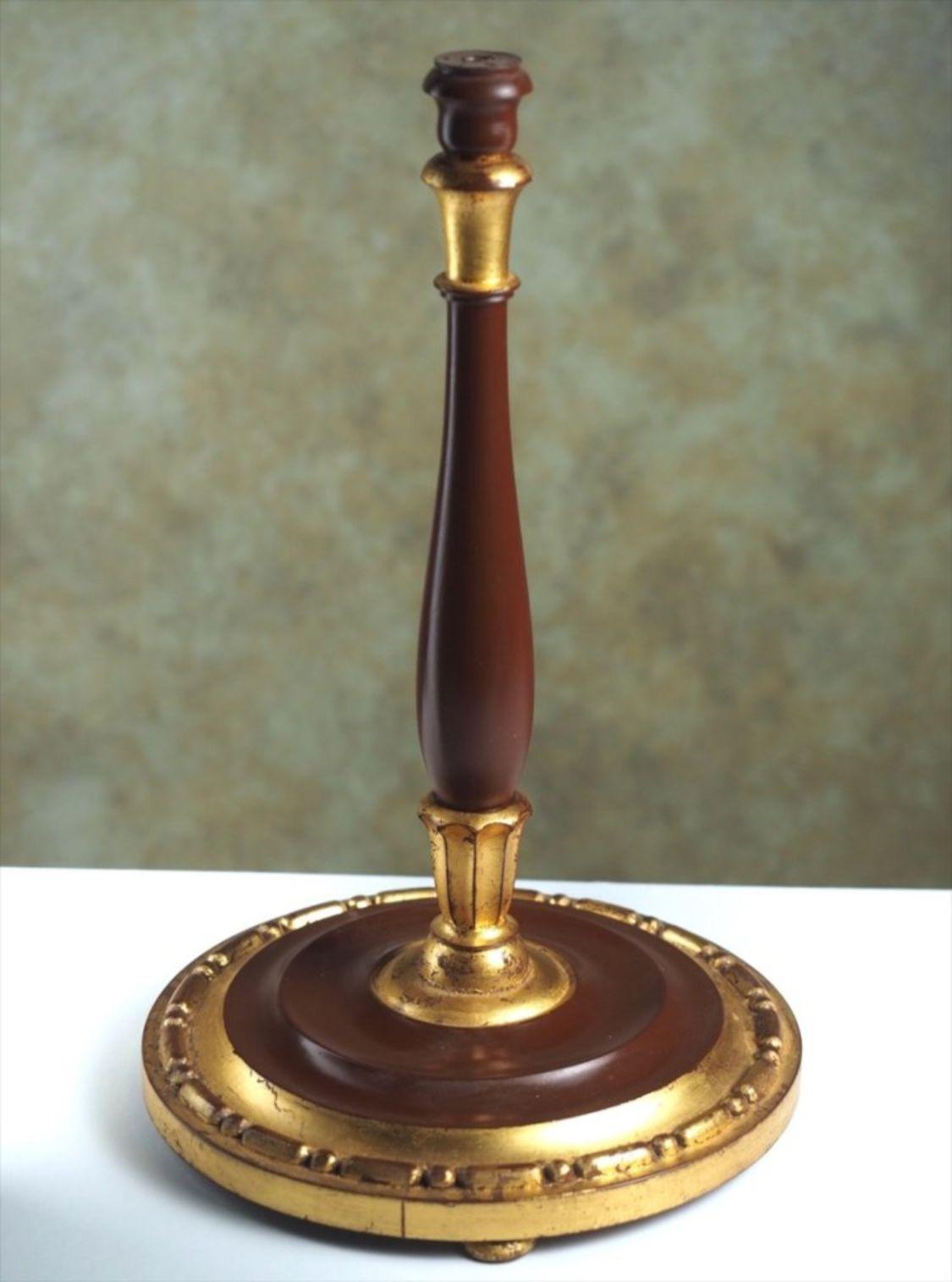 Classic French Art Deco table lamp in gilt and patinated sculpted wood, by Paul Follot, circa 1922. Measures: 14” high.

  