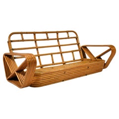 Paul Frankl Divano a 6 bande in rattan con bracci pretzel