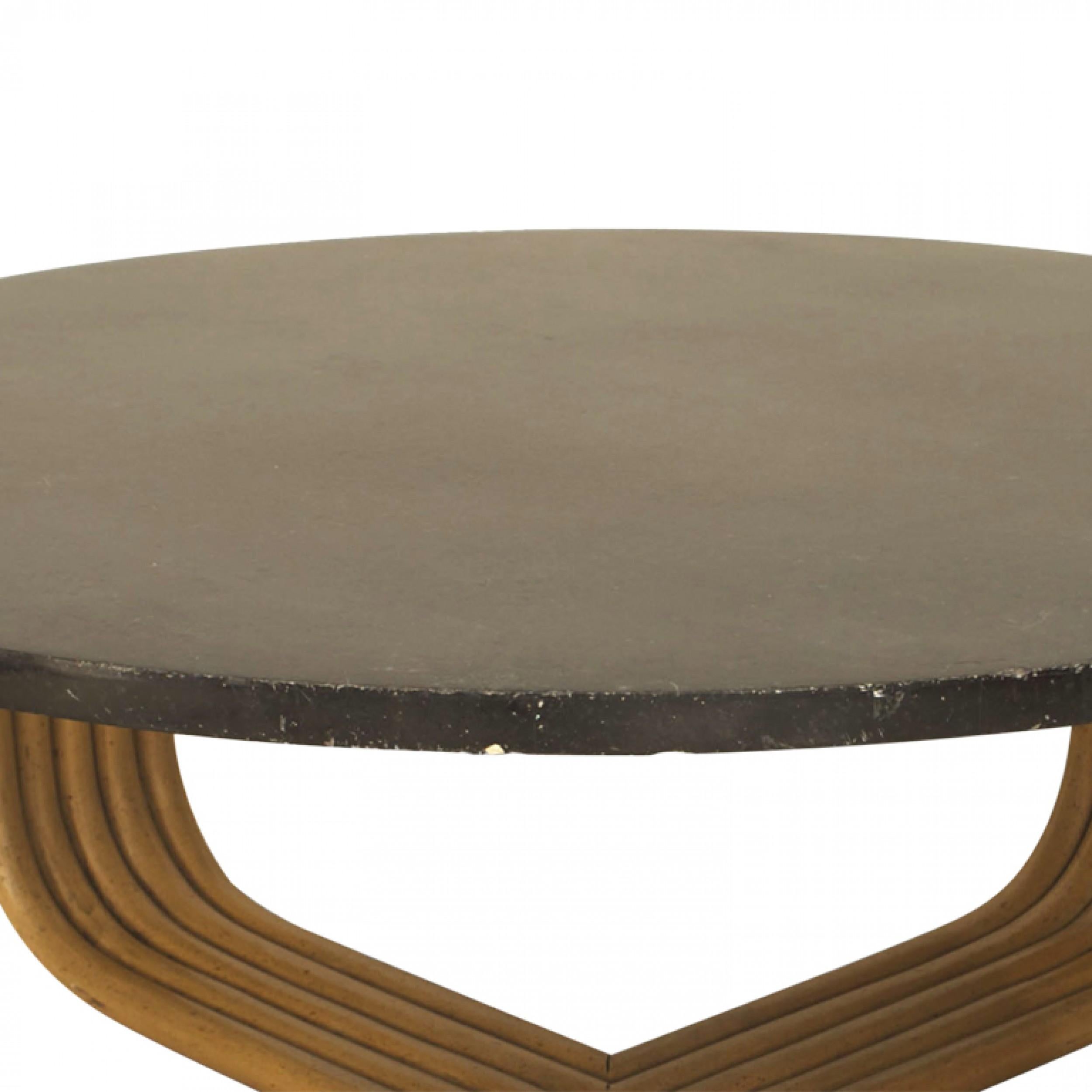 American Art Moderne (1930s) coffee table with a light beige painted faux bamboo base and a black bakelite inset top. (attributed to Paul Frankl)
