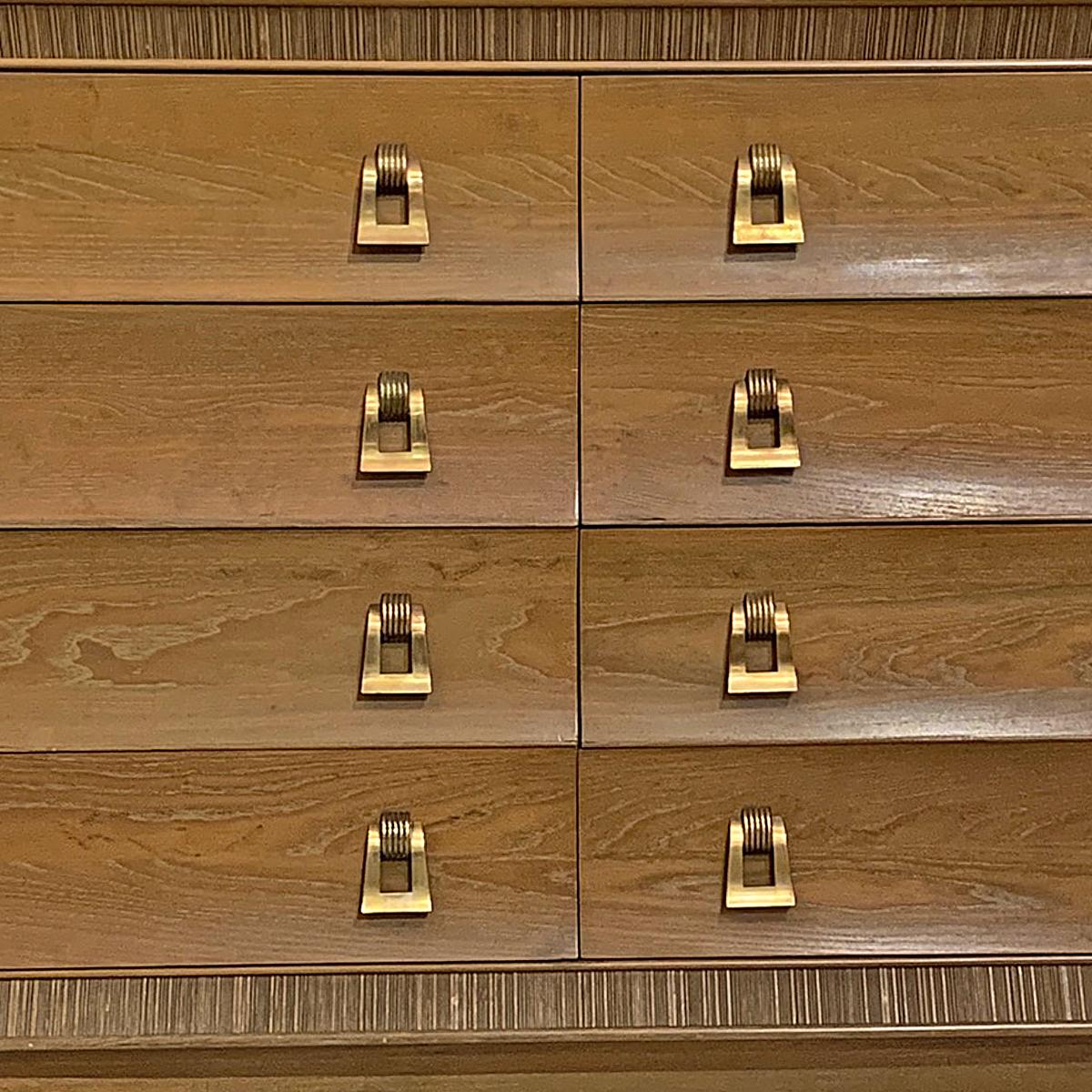 Paul Frankl / Brown Saltman Cerused & Combed Oak w. Brass Pulls 8 Drawer Dresser In Good Condition In Hudson, NY