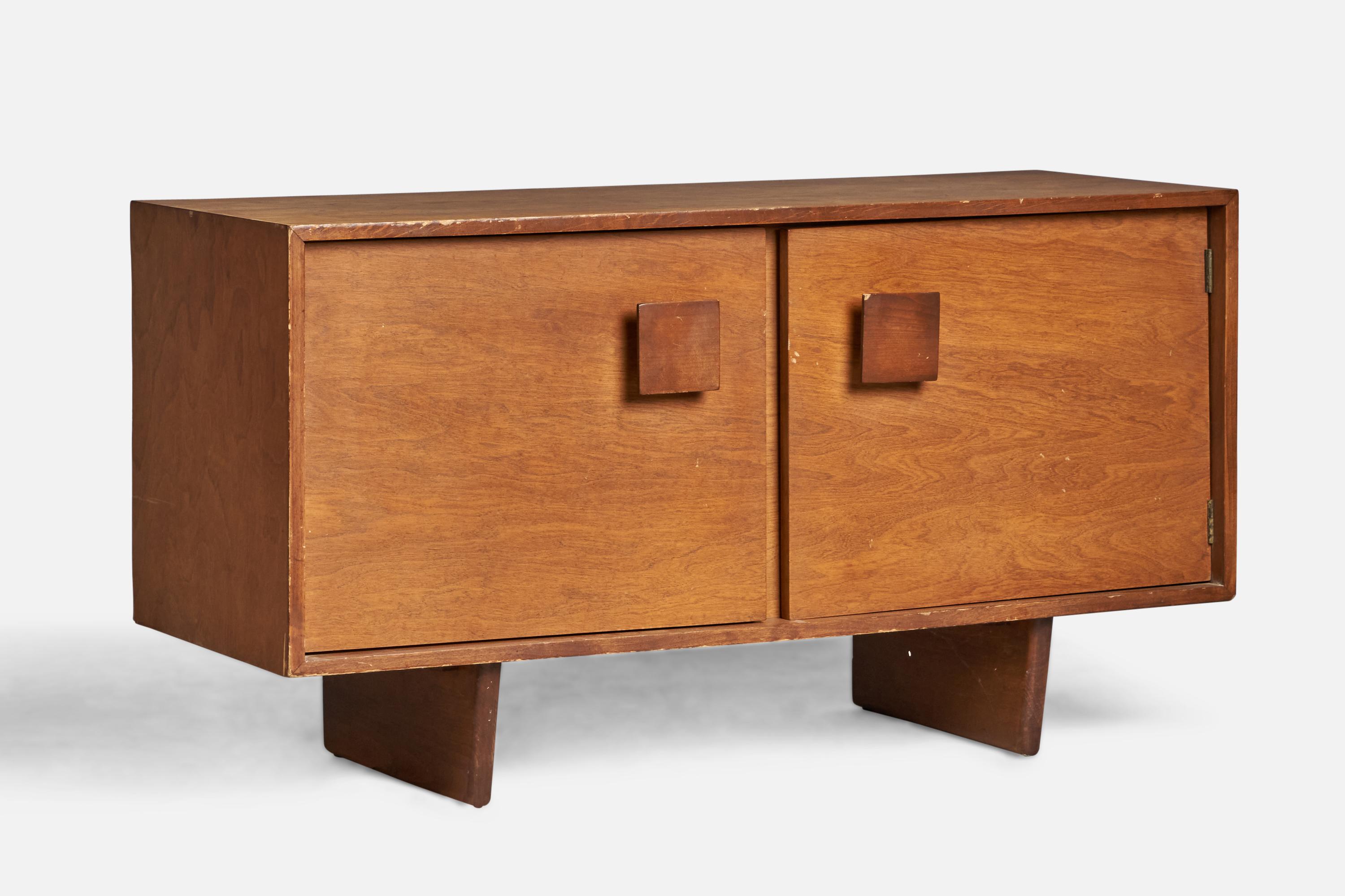 An oak cabinet designed by Paul Frankl and produced by Barzilay, USA, 1940s.